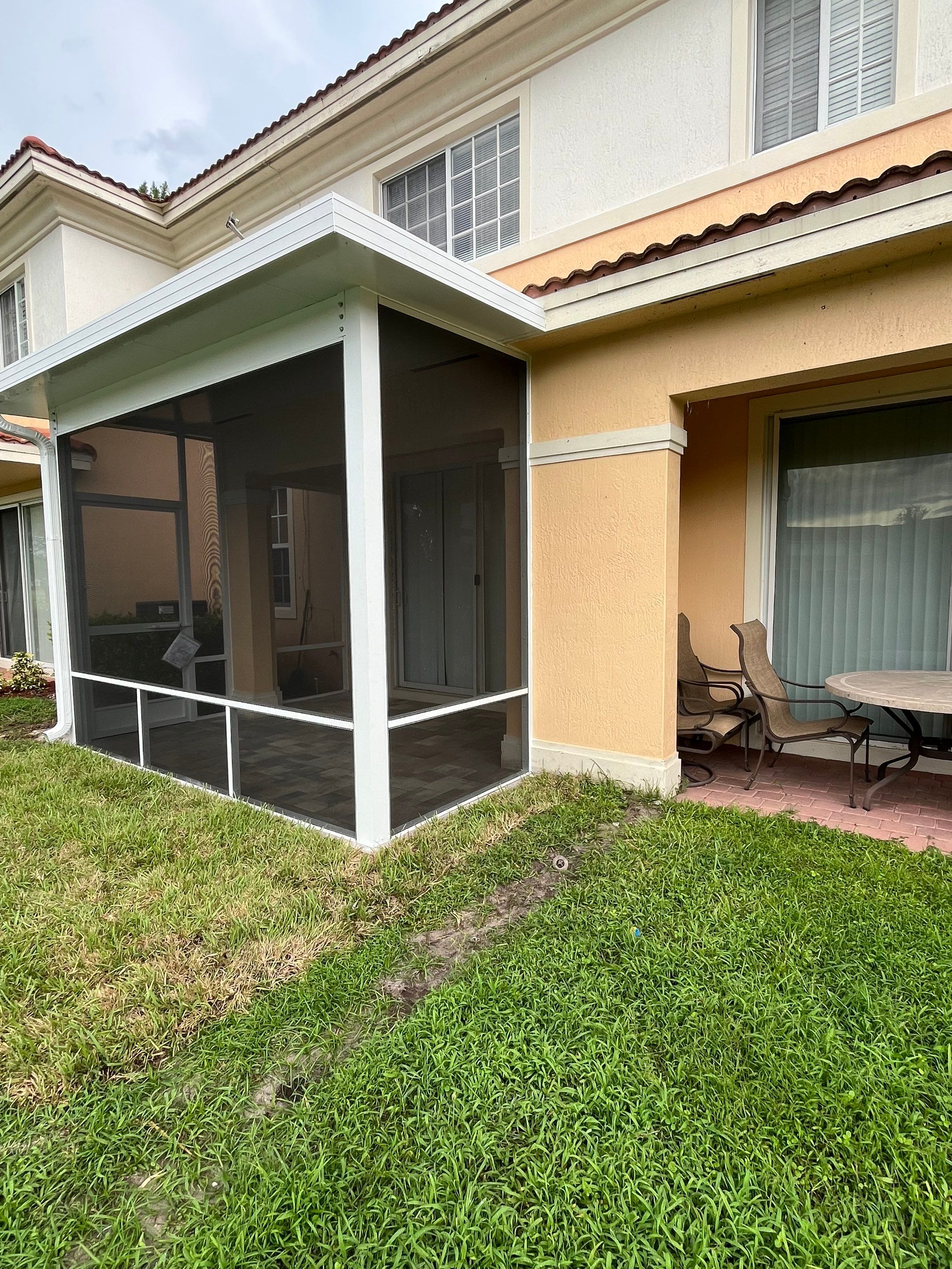 White Aluminum Screen Enclosure and Aluminum Roof Installation in Boynton Beach by The Screen Depot, Inc