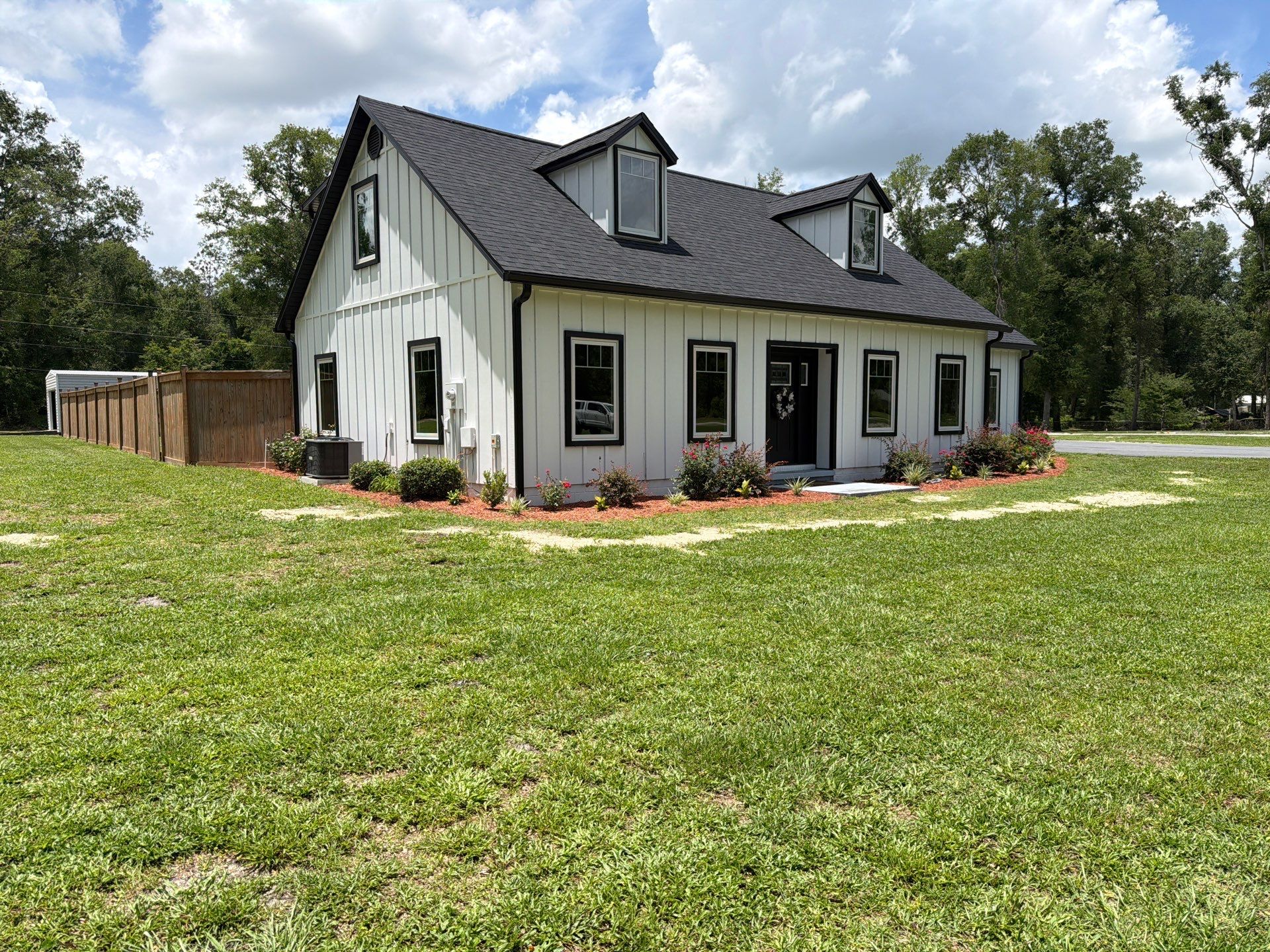 Andersen Window Installation for Modern Live Oak Farmhouse by Windows & Doors Store