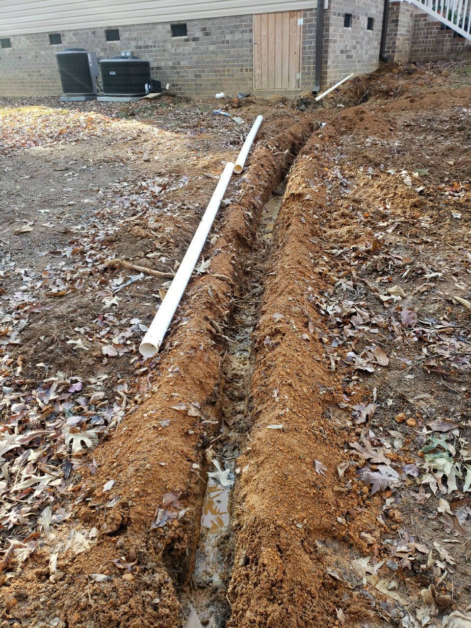 Crawl space encapsulation and exterior drainage by Power Wash Masters LLC
