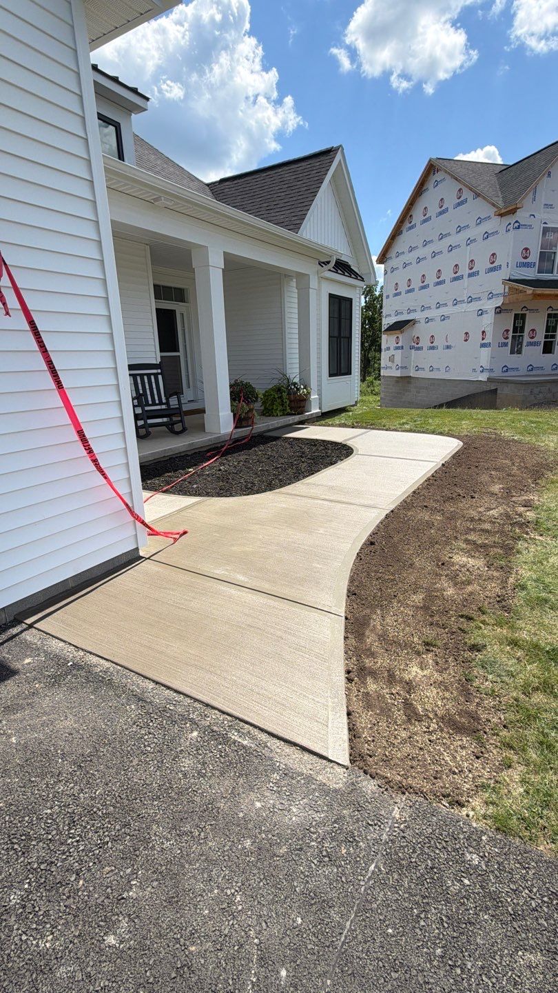 Pittsford Broom Finished Walkway by NG Masonry & Construction LLC