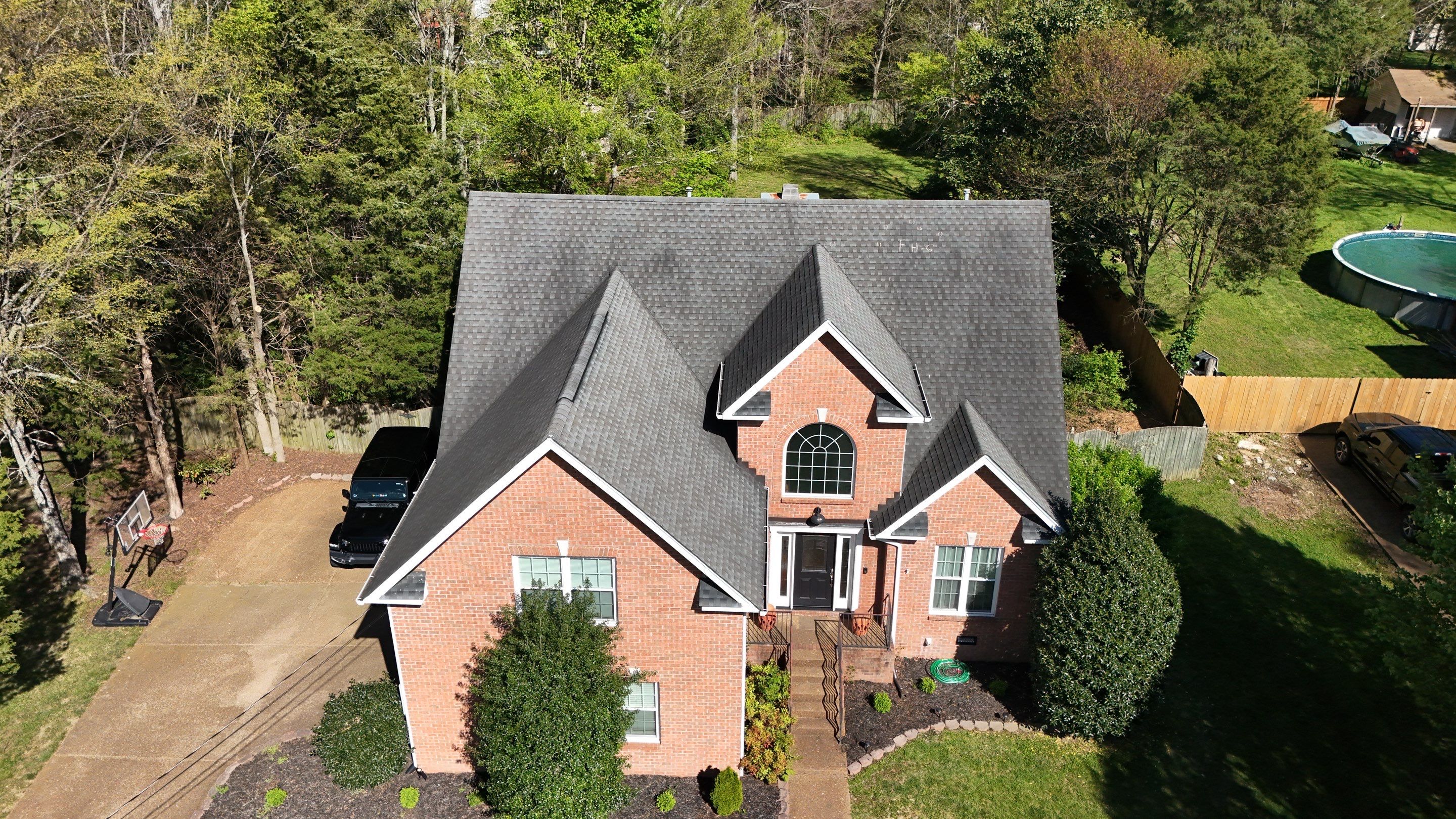 Charcoal Black Re-Roof by Royal House LLC