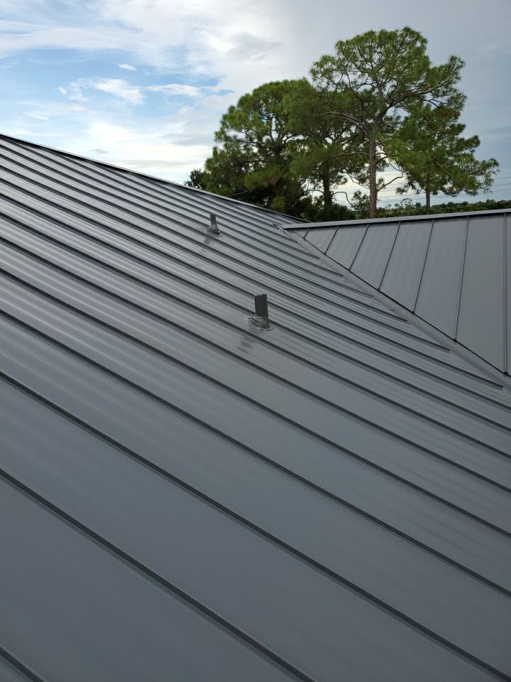 Residential Roofing Installation using 1" Nail strip metal roof by BLUES BROTHERS CONSTRUCTION CORP