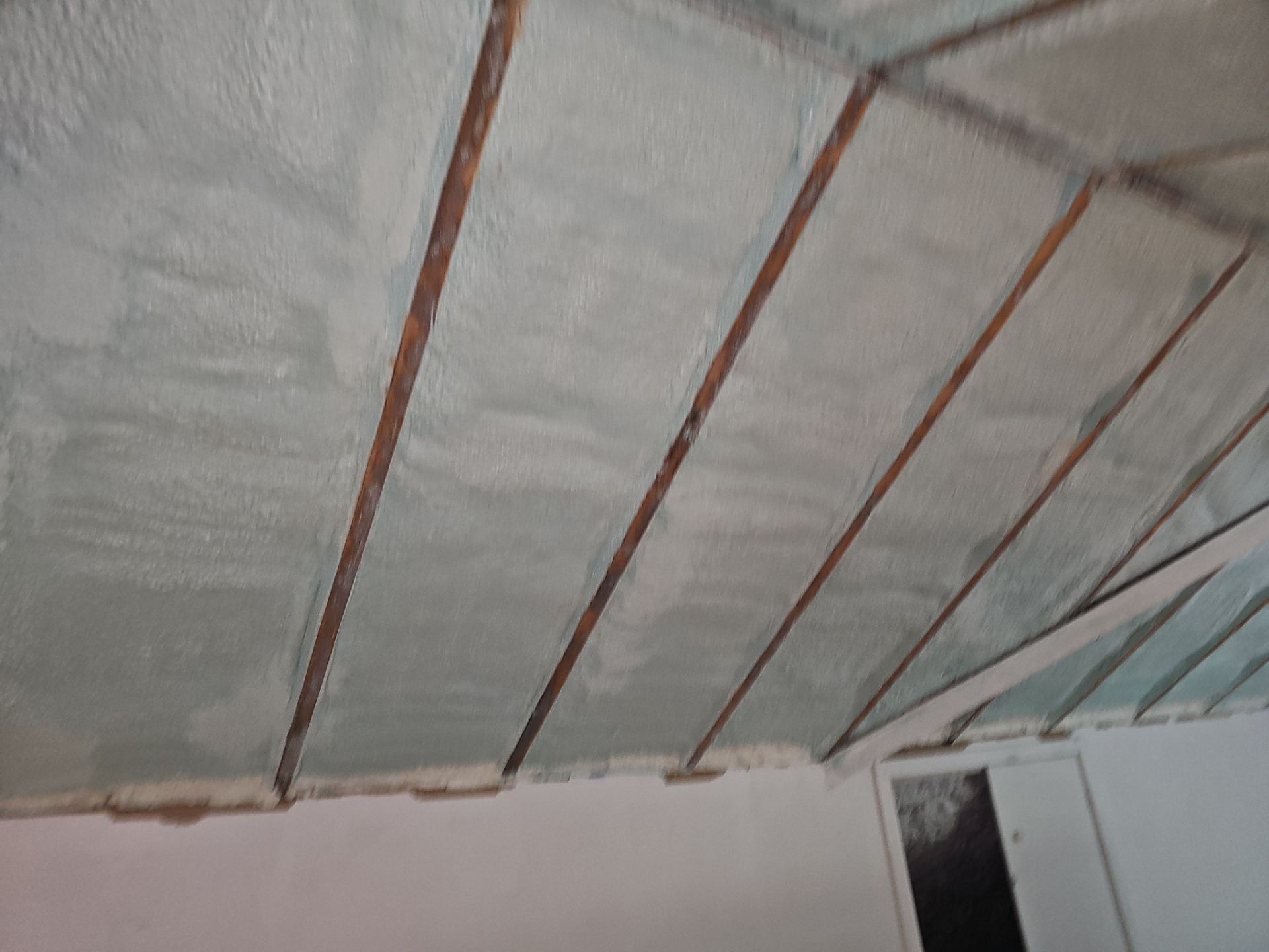 Attic Insulation using open cell spray foam by NYS Foam & Energy