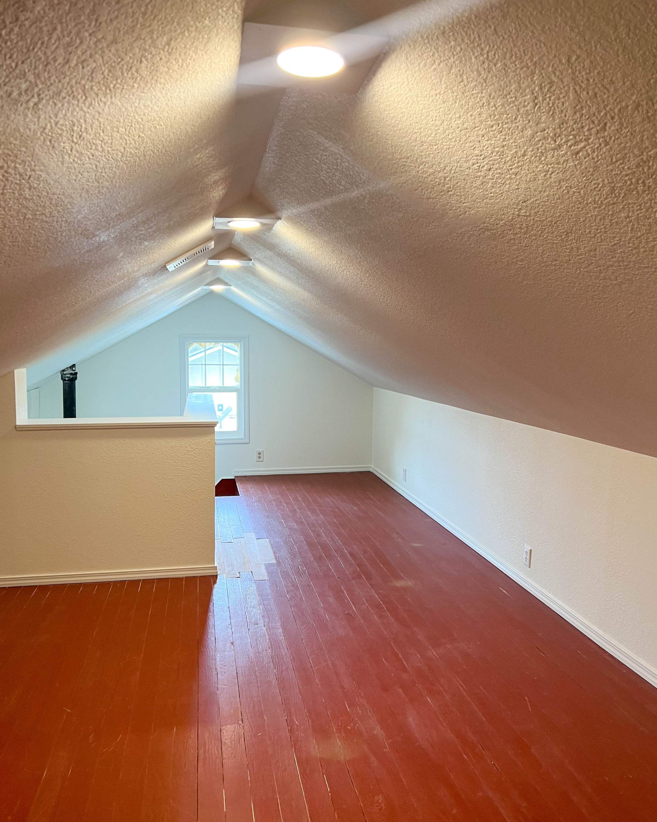 Attic Room Finished with Drywall by Villegas Remodeling, LLC