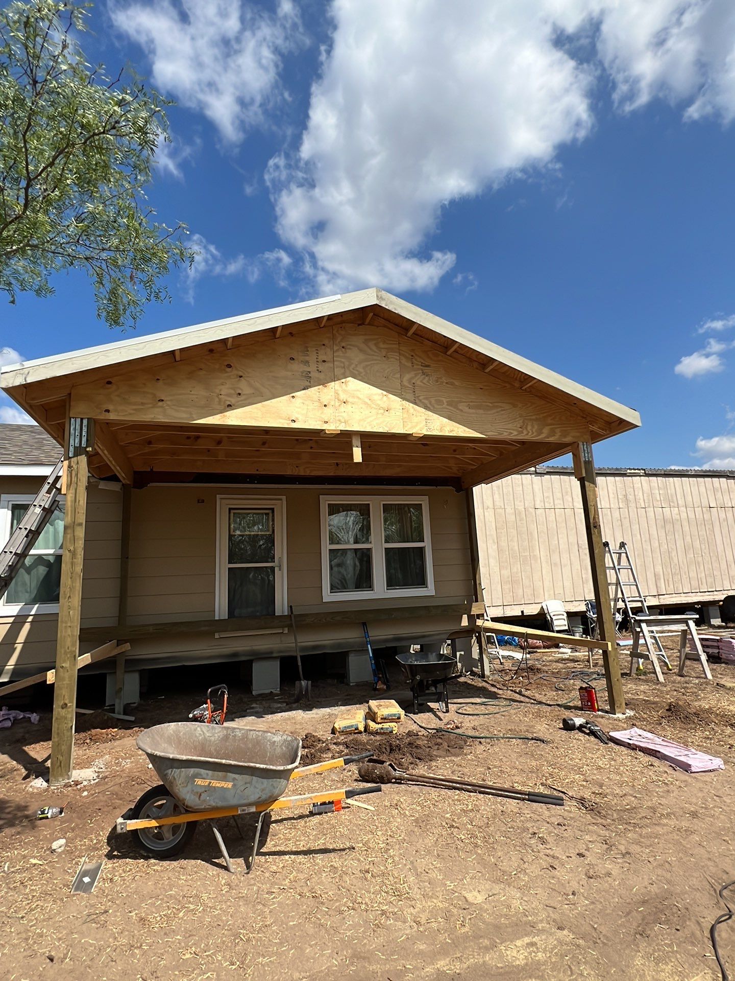 Front Porch Sitt'n by Bayfront Roofing and Construction