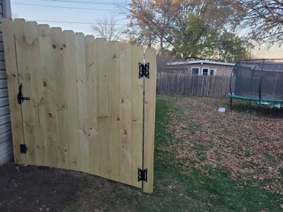 New Pressure-Treated Wood Privacy Fence and Gate in Charles City