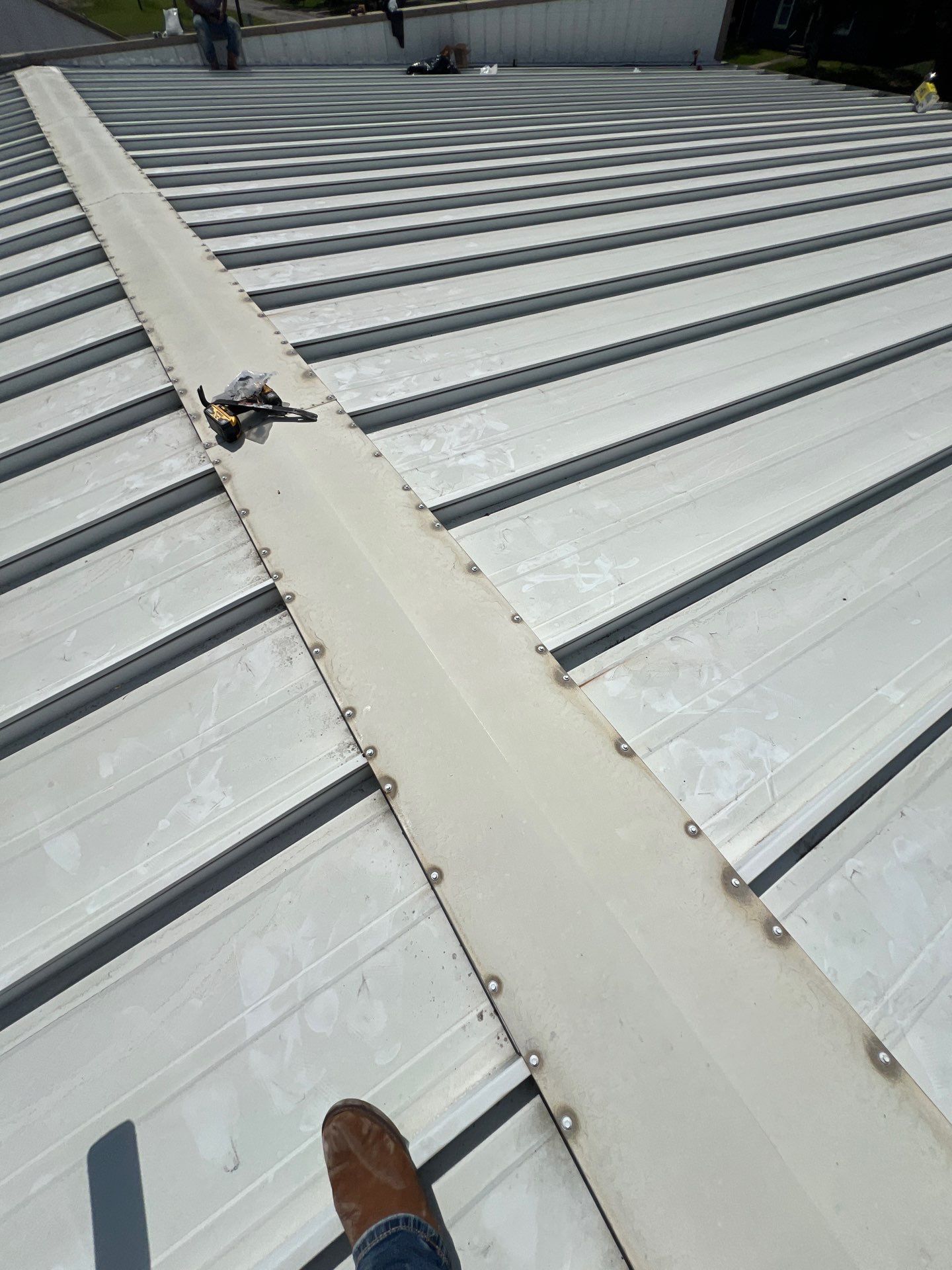 Commercial Roofing Repair using Metal by Roof Repair Company