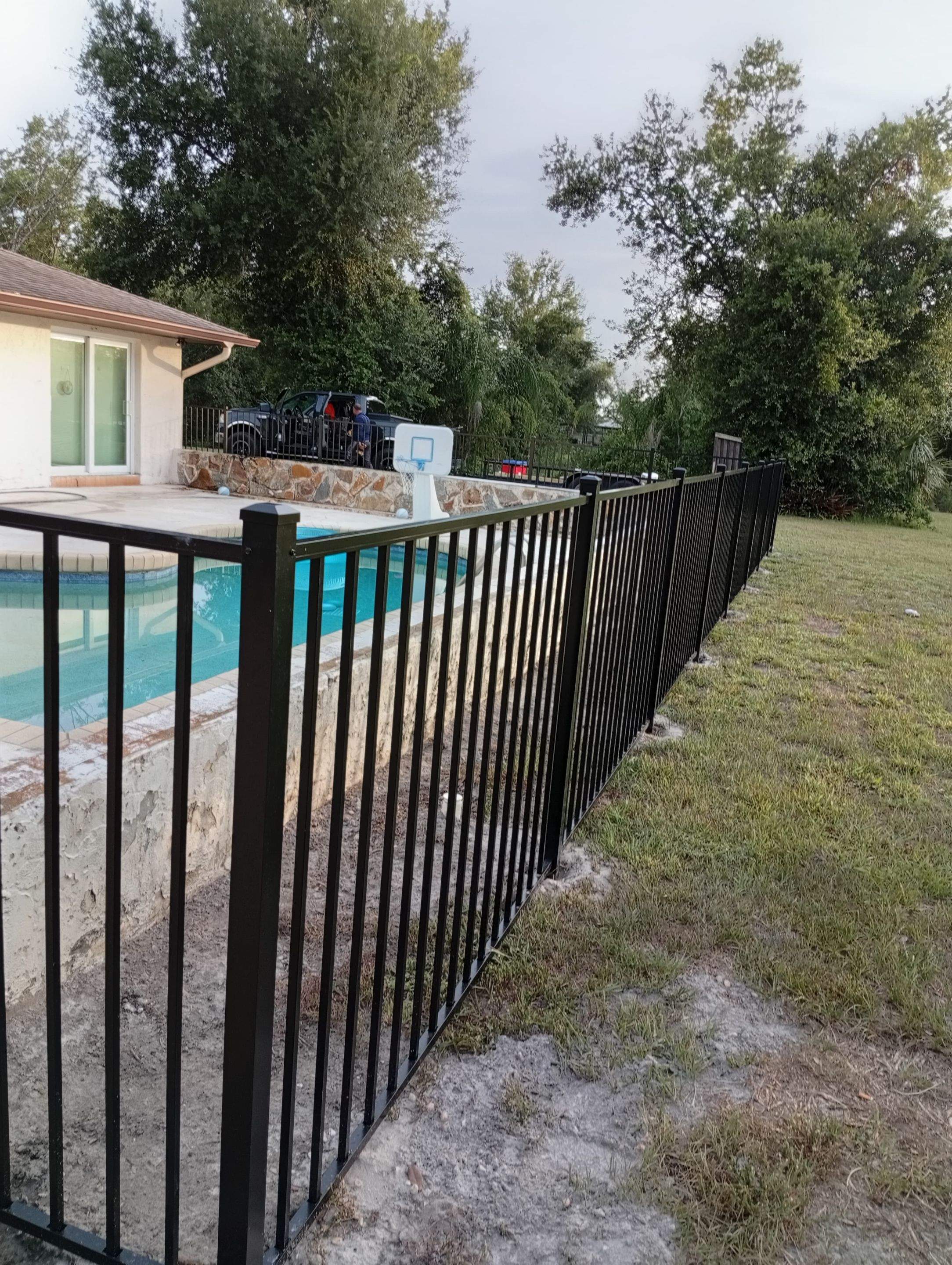 Black Aluminum Pool Safety Fence Installation in Punta Gorda by True Fence LLC