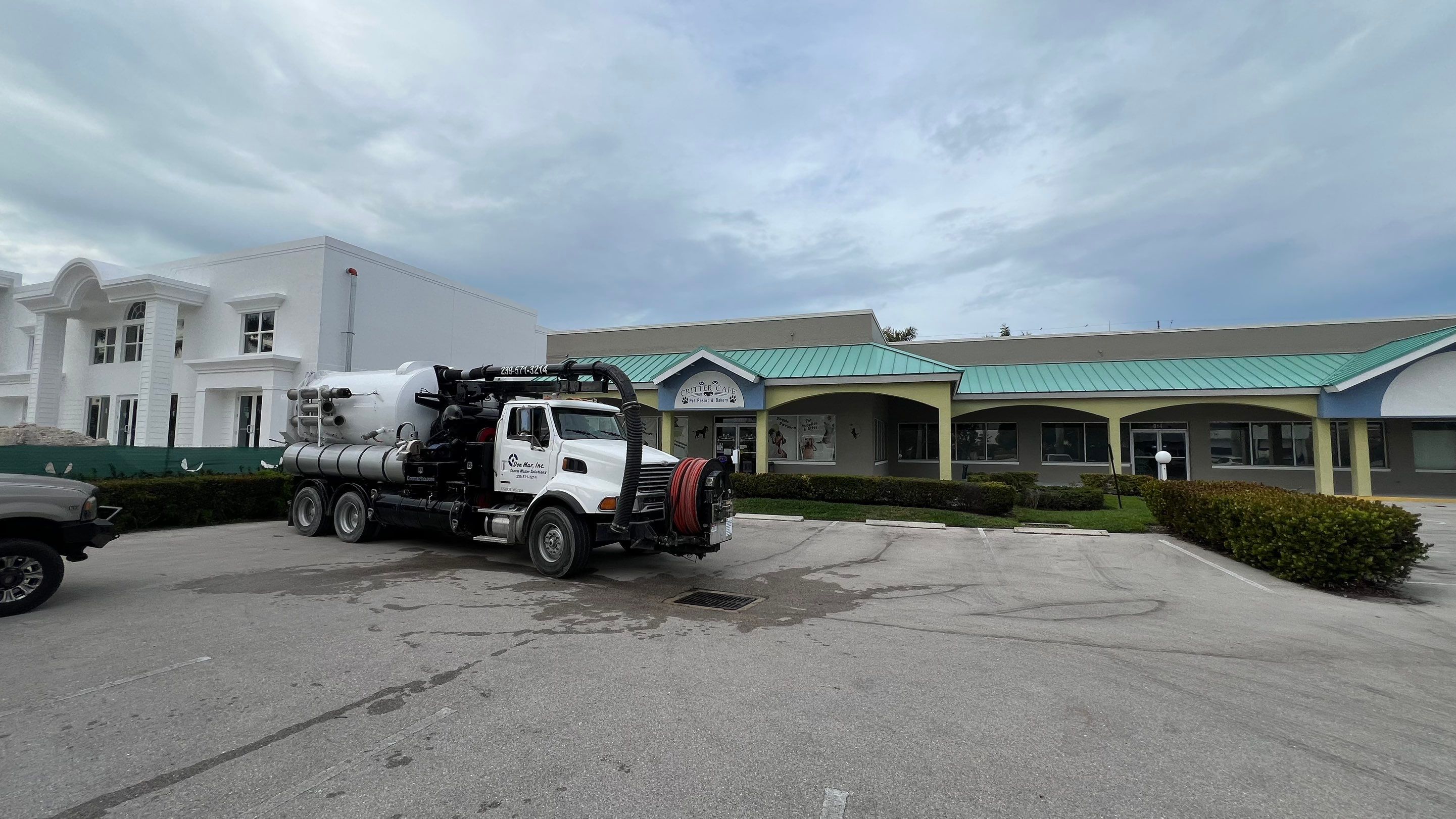 Stromwater System Maintenance at Bill Smith Appliances / Critter Cafe Marco Island Catch Basin by Don Mar, Inc. Storm Water Solutions