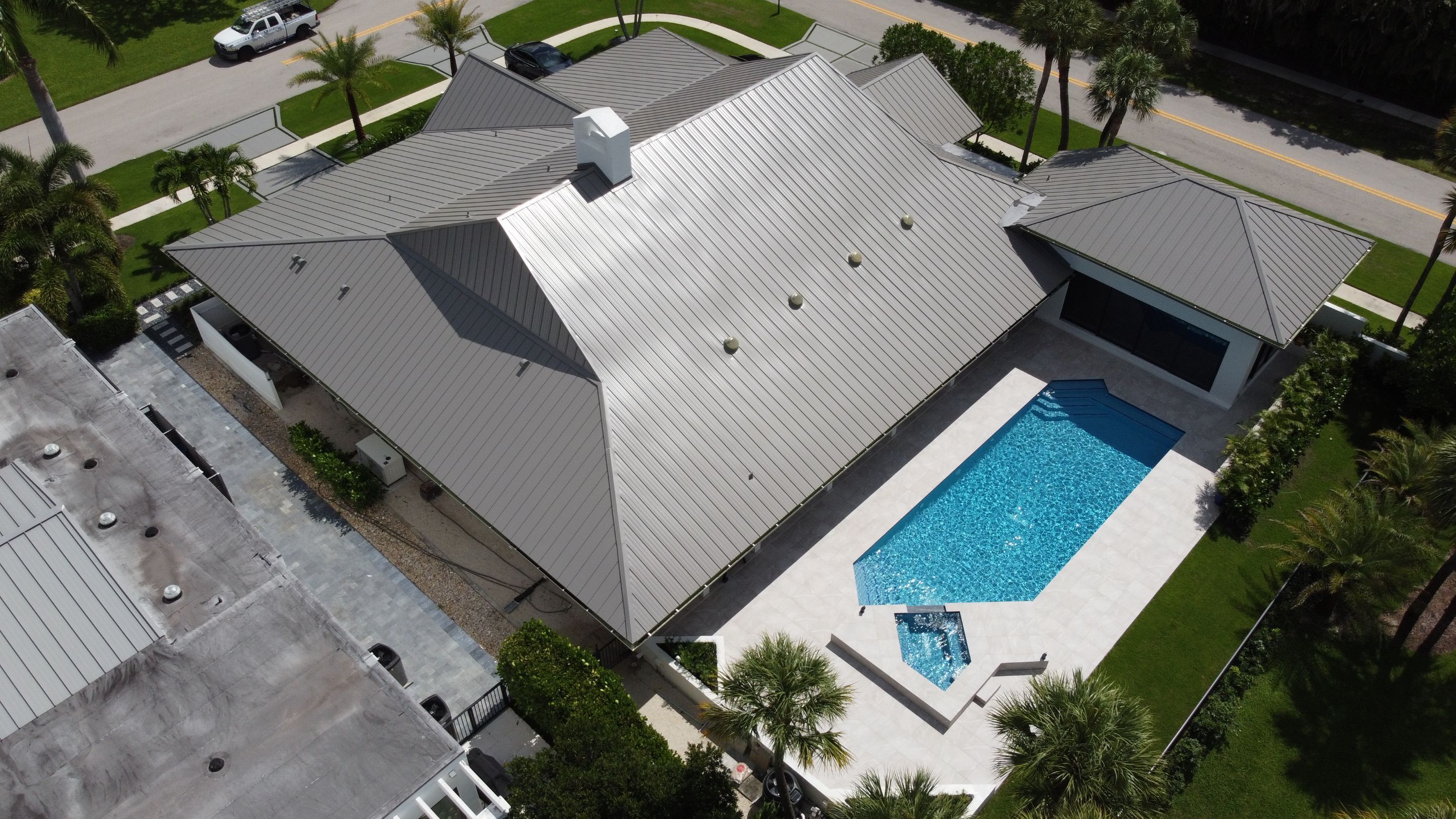 Residential Roofing Installation using 1" Nail strip metal roof by BLUES BROTHERS CONSTRUCTION CORP