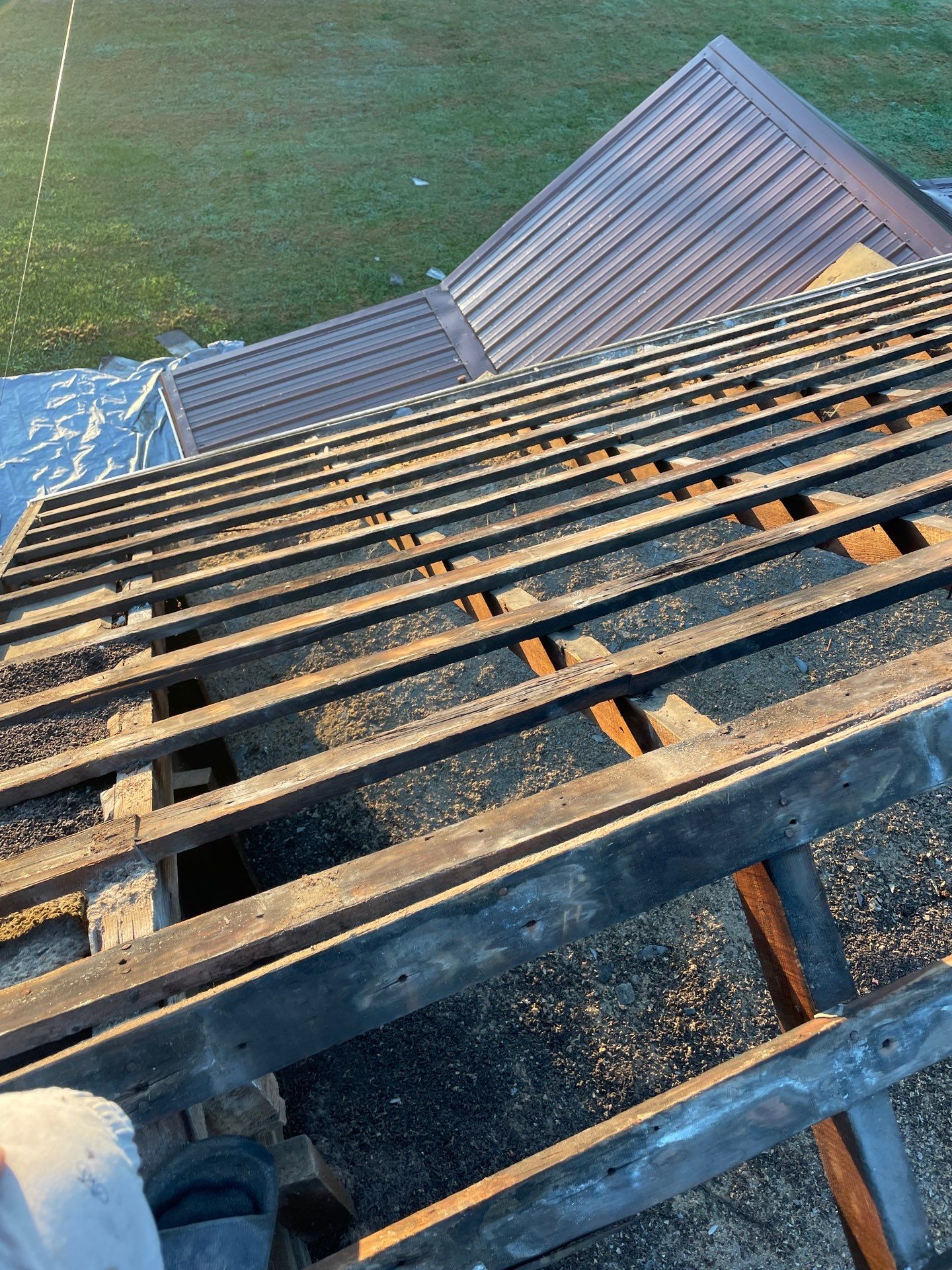 Residential Roofing Installation using Metal by Rainstoppers Roofing