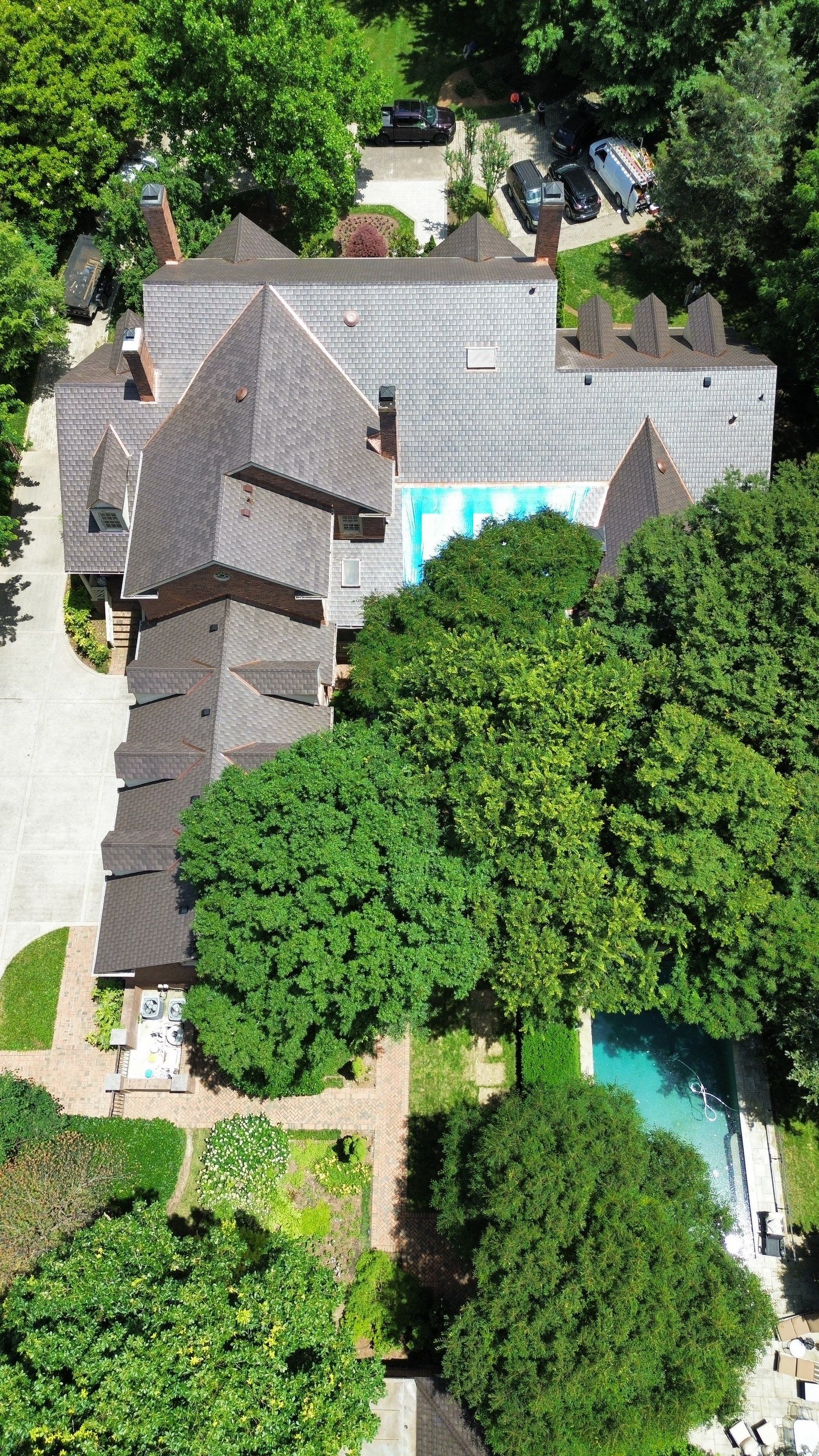 Residential Roofing Installation Using Enviroshake Synthetic Slate by Undersun Roofing 