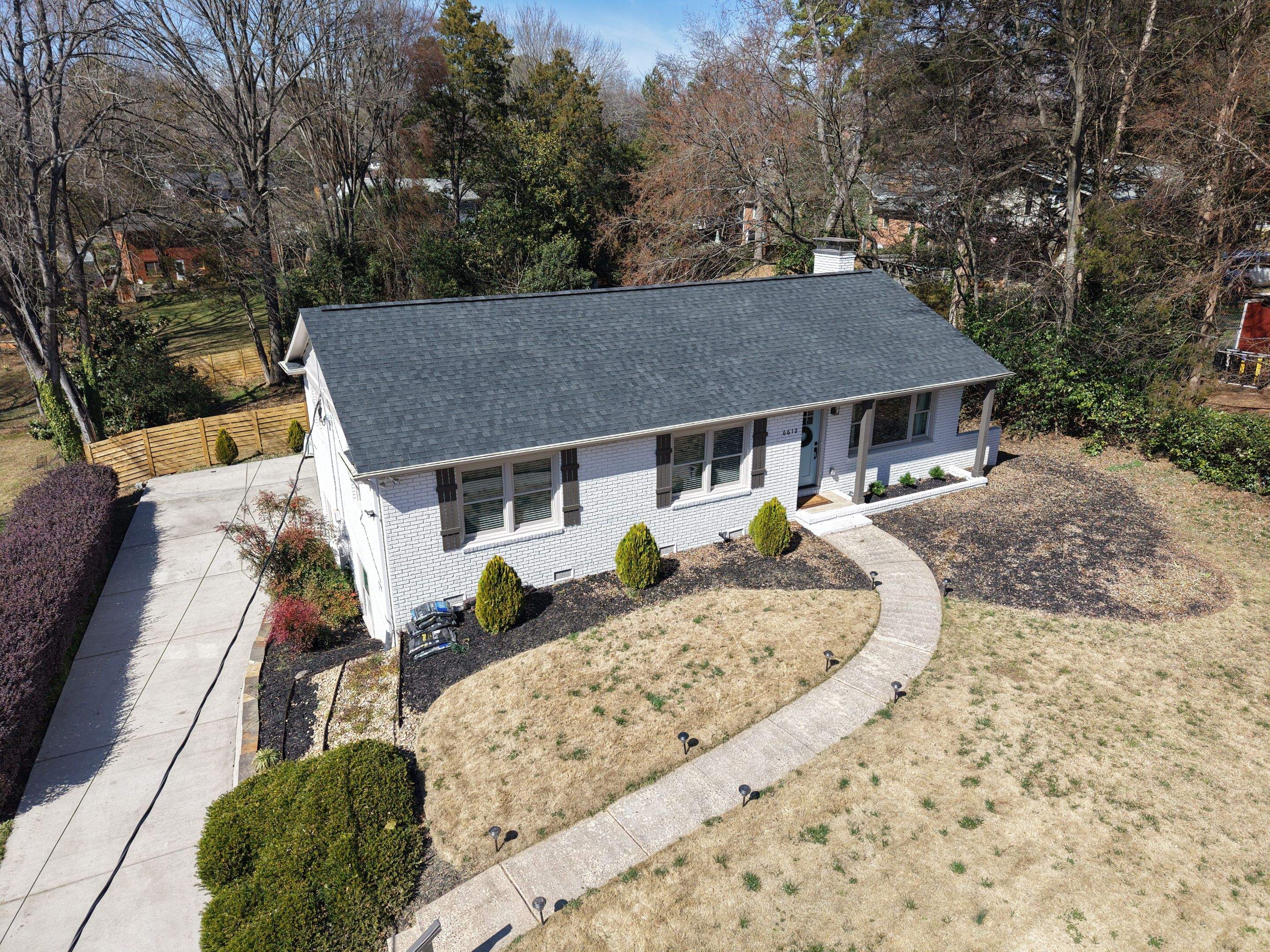 Residential Roofing Installation using TAMKO TITAN XT Rustic Black by RISE Roofing & Restoration, LLC