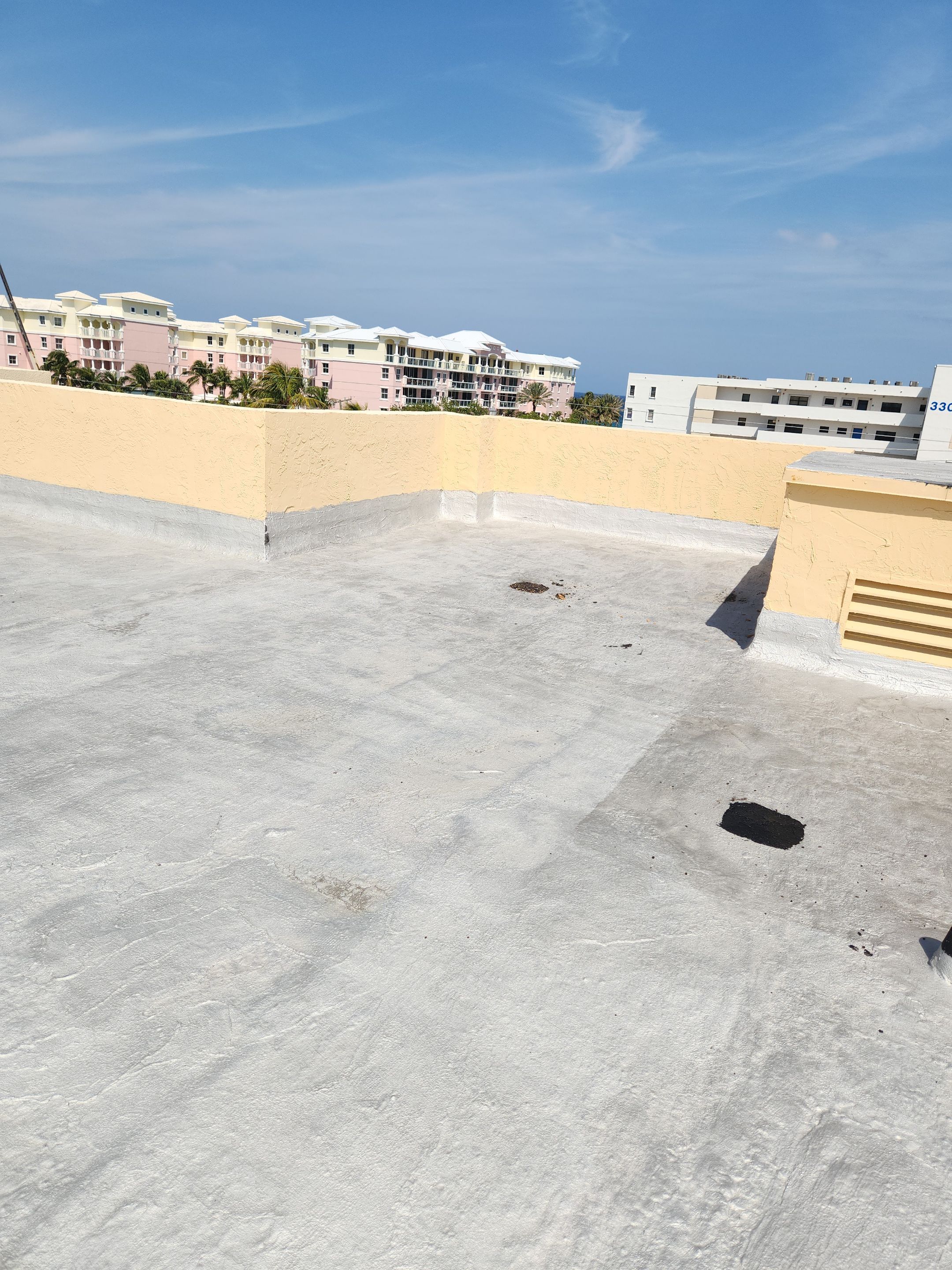 Commercial Flat Roof Repair and Silicone Coating in Deerfield Beach by Aastro Roofing