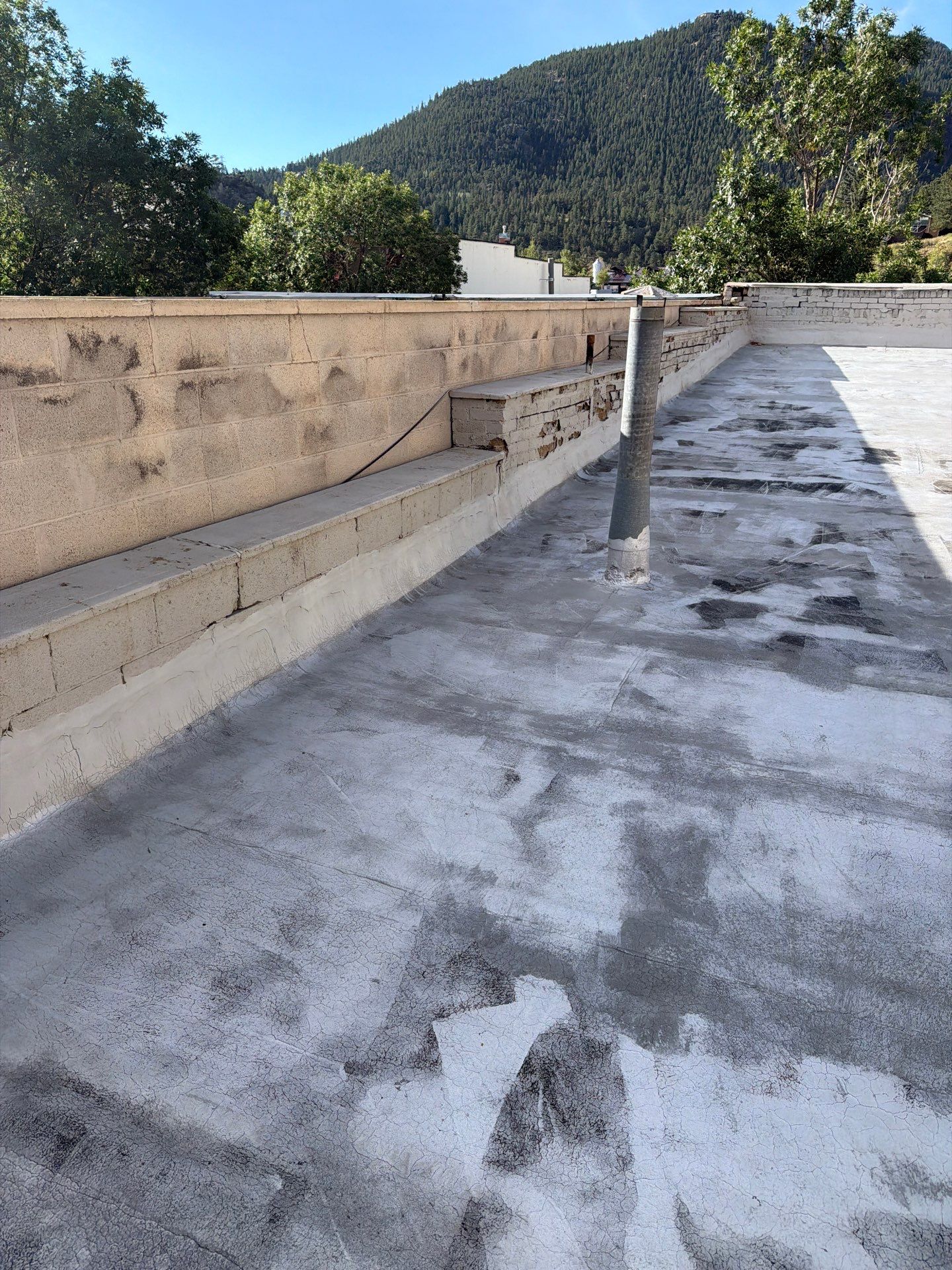 Estes Park "The Taffy Shop" Before & After Gaco Coating by Blue Peaks Roofing LLC