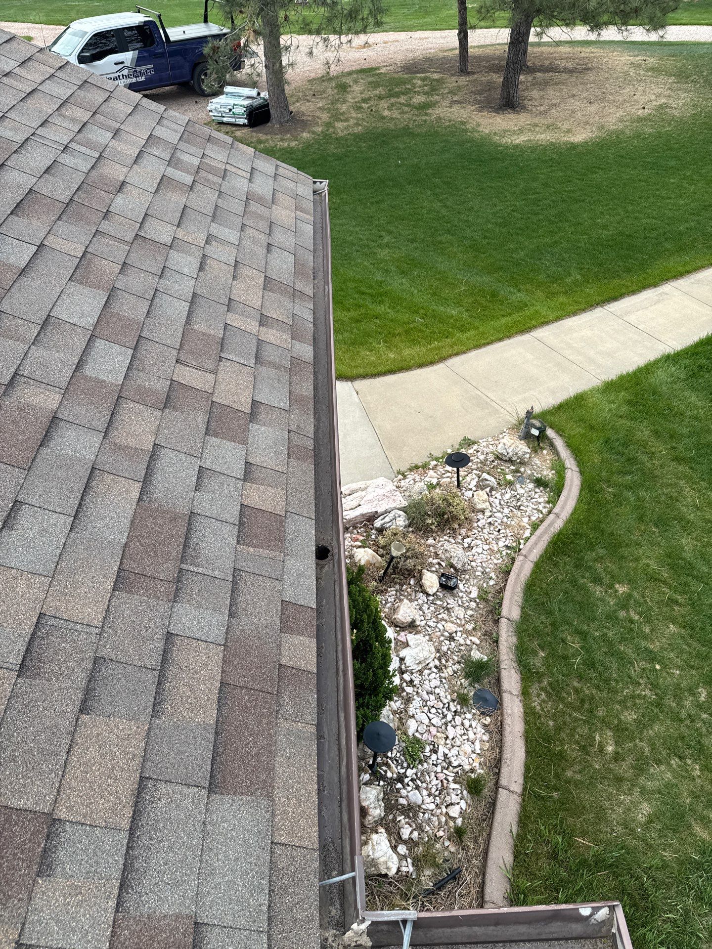 Architectural Shingle Roof and Gutter Installation in Rapid City by Weather-Tite Exteriors LLC