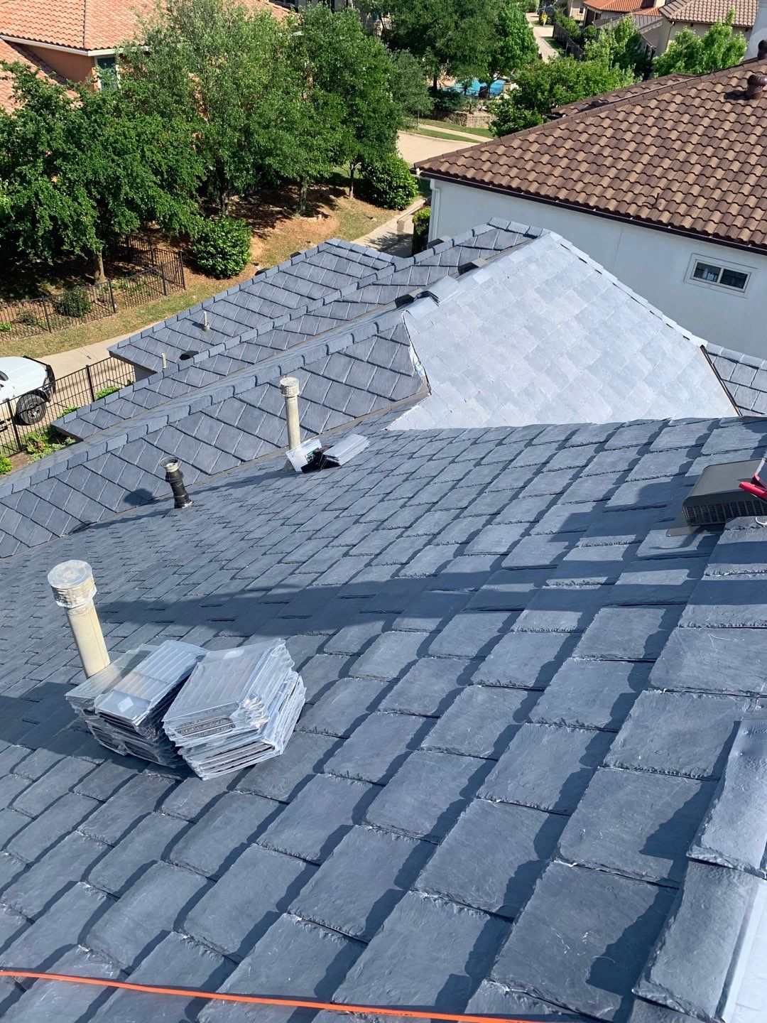 Roof Replacement using Davinci Bell Slate Shingles by Elite Roofing LLC