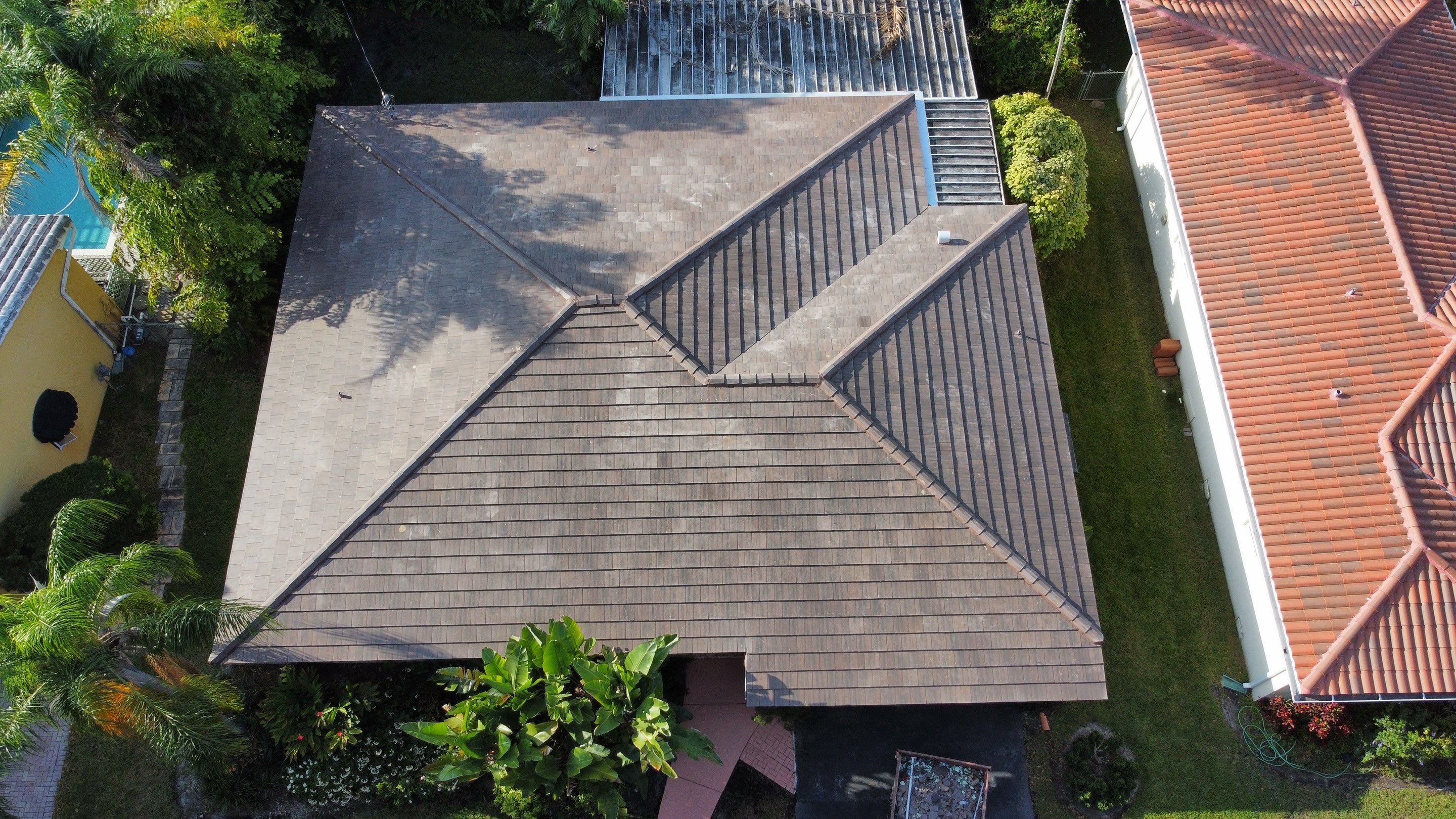 Residential Roofing Installation using 13" Flat Tile by BOB HILSON & CO INC