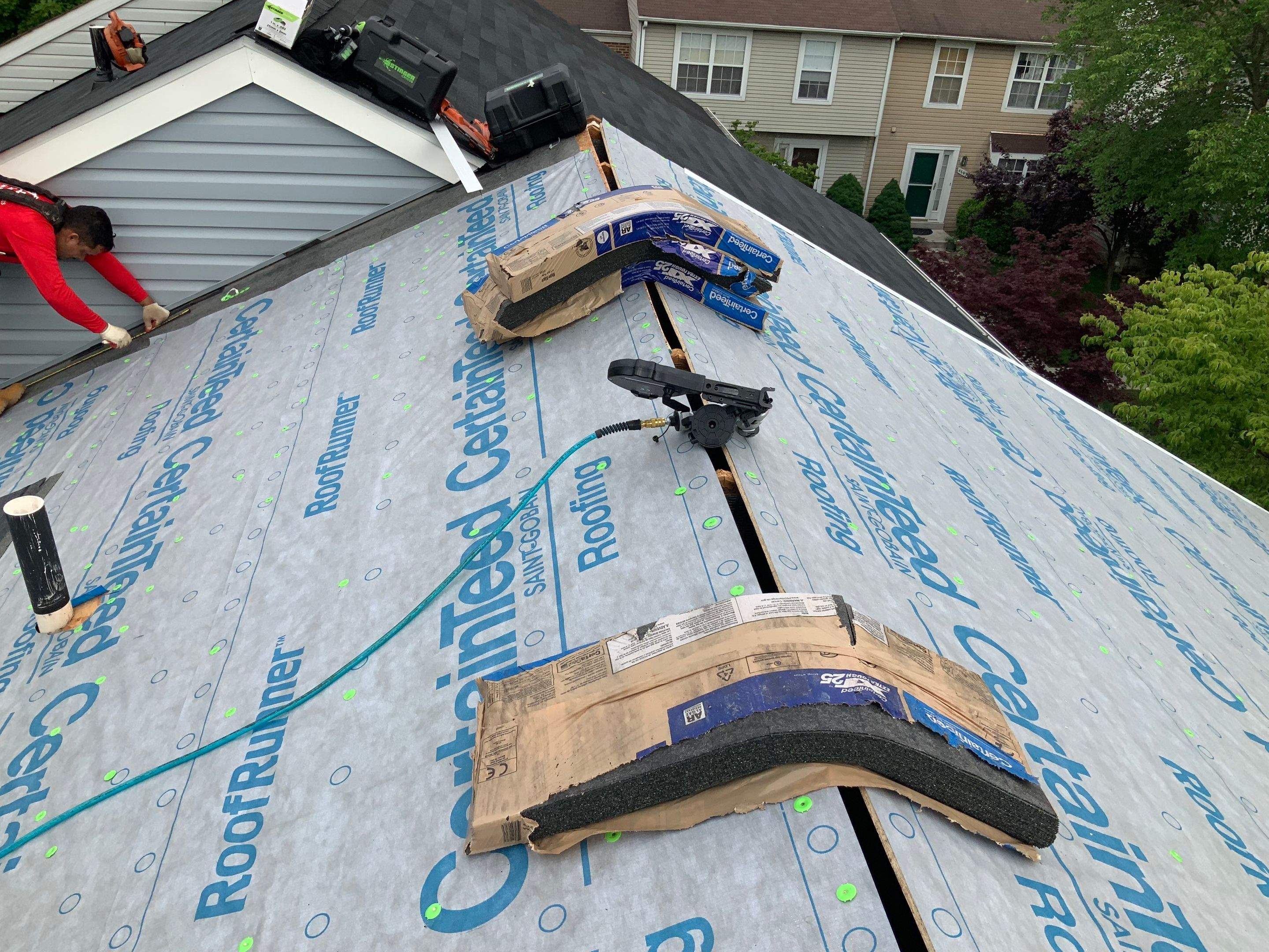 Residential Roofing Installation using XT-25 Color Moire Black by Alpha Design Services