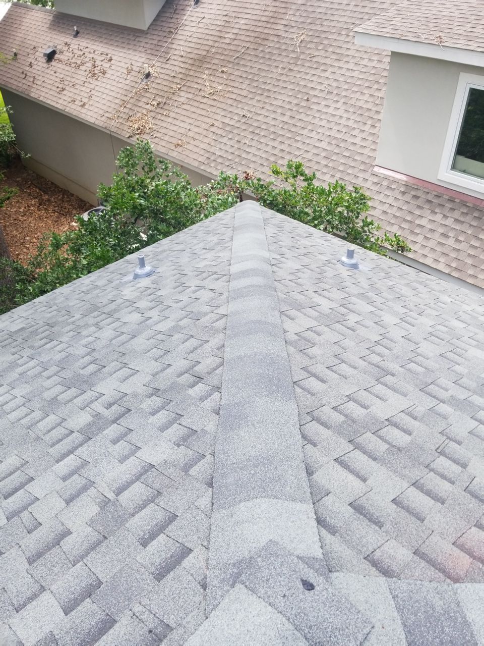 Residential Roofing Installation using Roof Replacement by American Roofing & Construction LLC