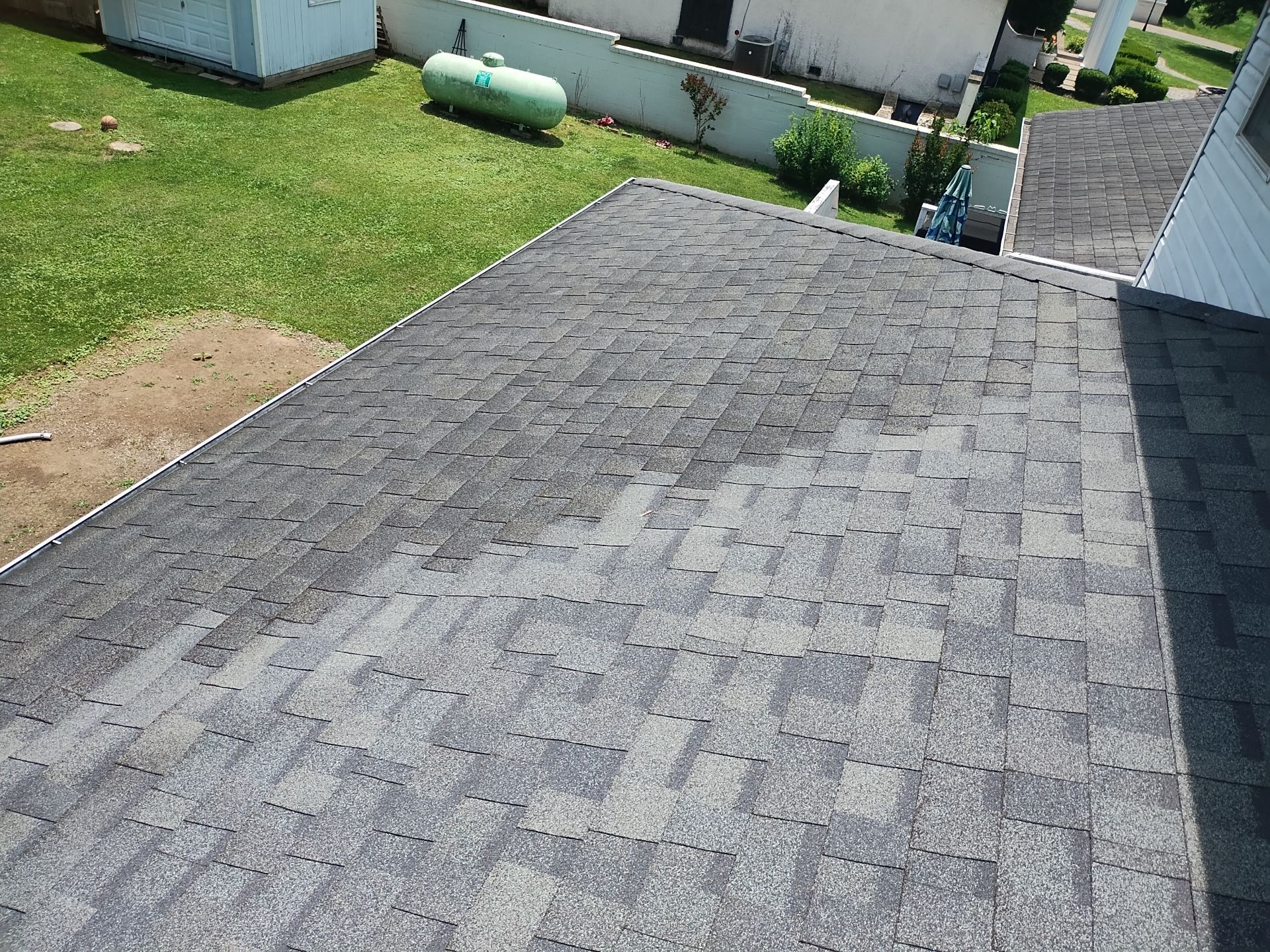 Residential Roofing Installation using Performance Shingles by Mr. Roofer