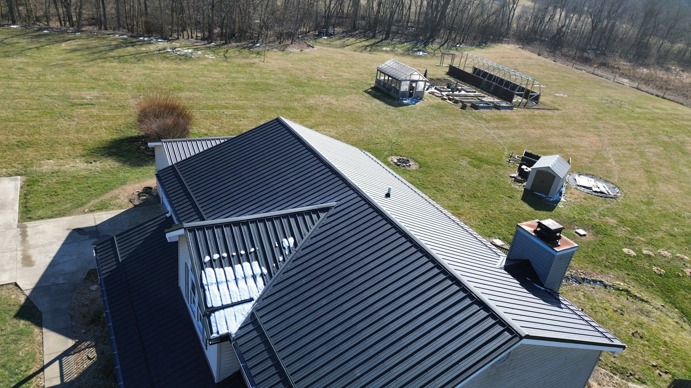 Residential Roofing Installation using Performance Panel Metal - Frost Black by RoofX 