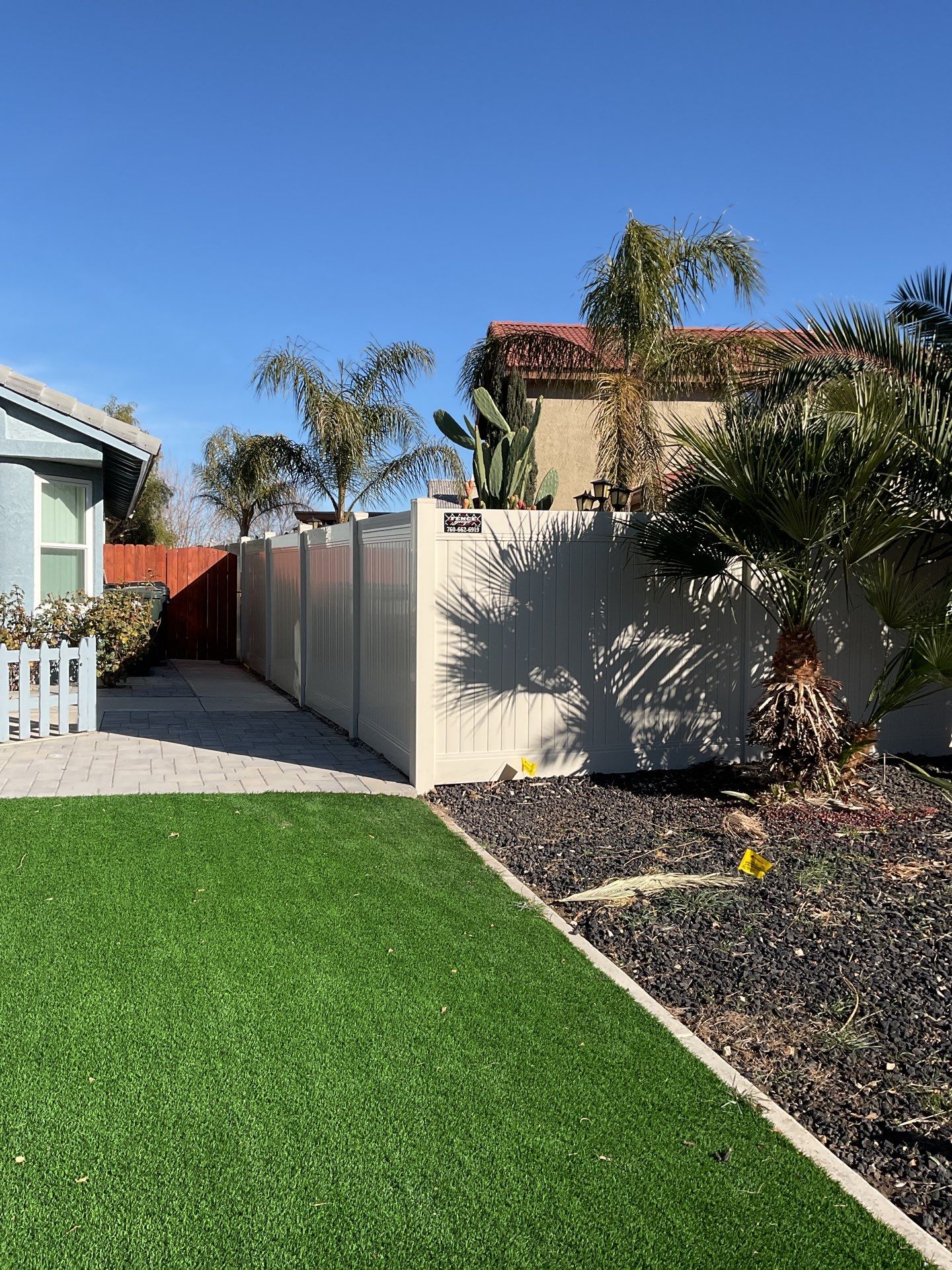 Beautiful vinyl fence installation by Fence Guys Inc.