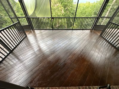 Wood Deck Refinishing and Black Metal Railing Upgrade in Travelers Rest