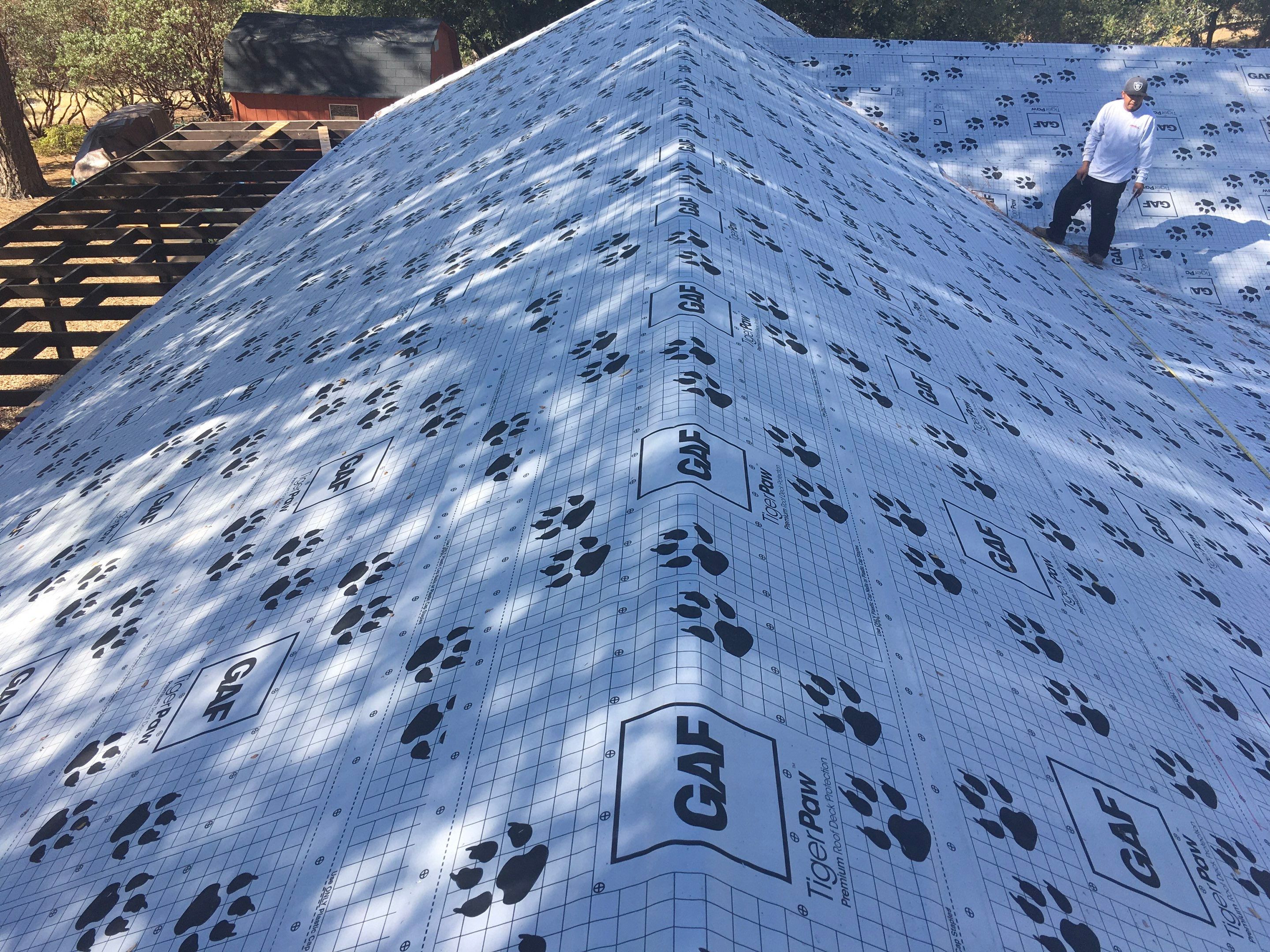 Metal roofing installation using Standing seam metal roofing system by Straight Edge Roofing Inc