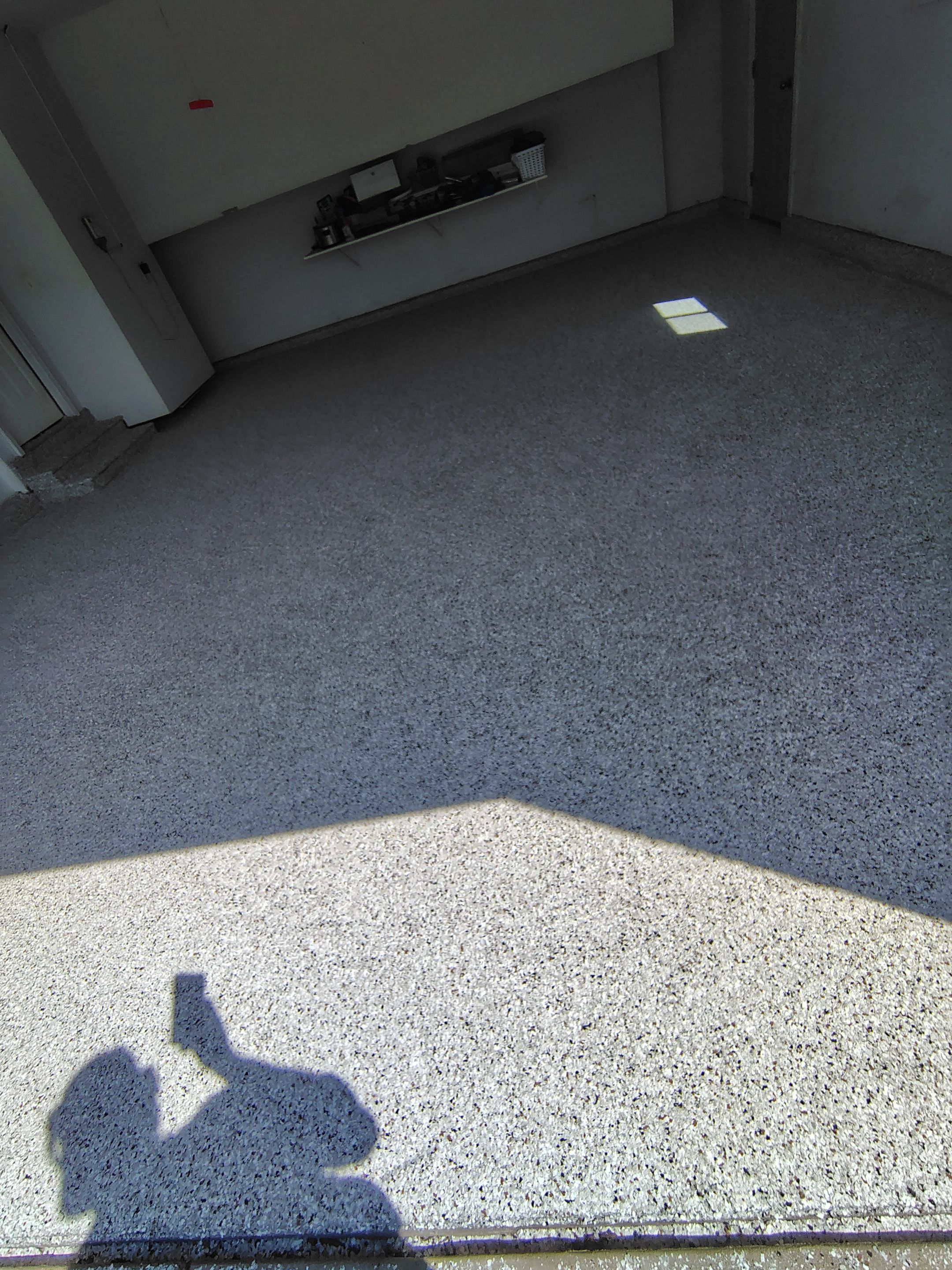 Decorative Chip Epoxy Garage Floor Coating in Sioux Falls by Select Painting, Coatings & Garage Cabinets