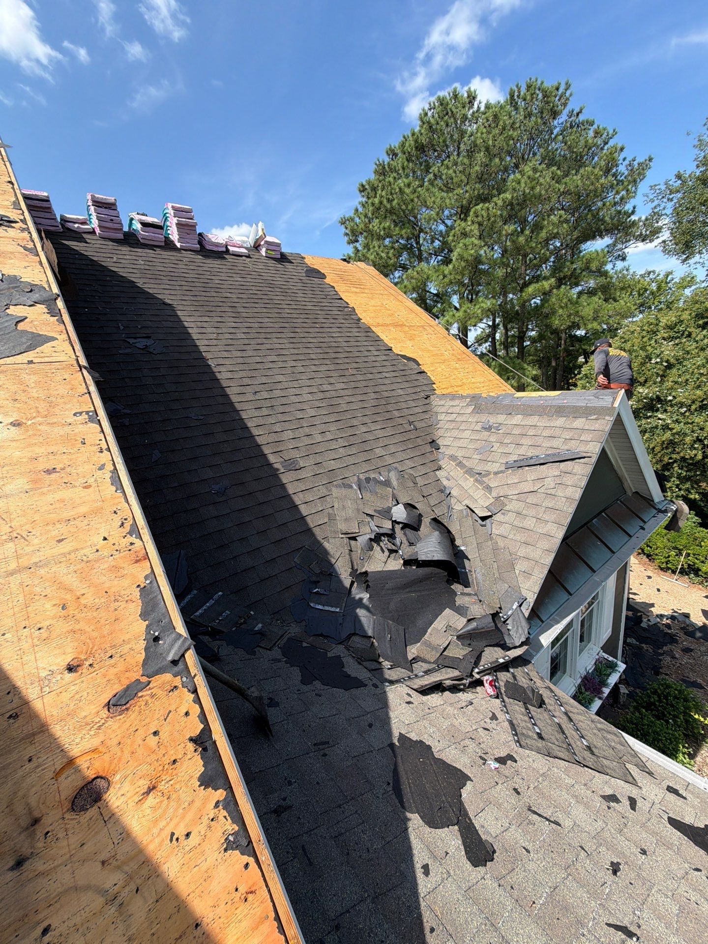 Roof Replacement and White Gutter Installation in Gloucester by Cade Construction