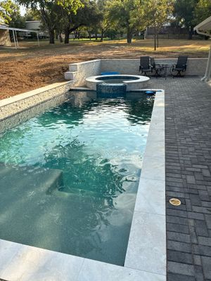 Geometric Pool with Raised Stone Spa