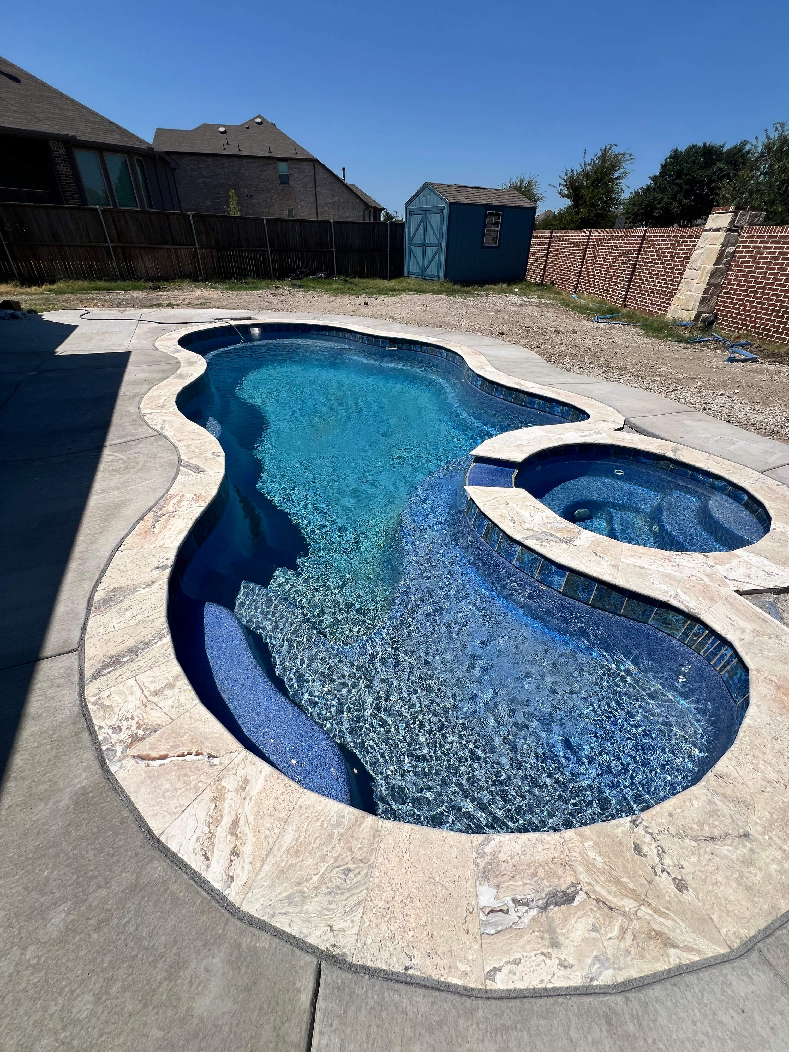 Freeform Pool with Spa by Pinnacle Pools and Spas - DFW