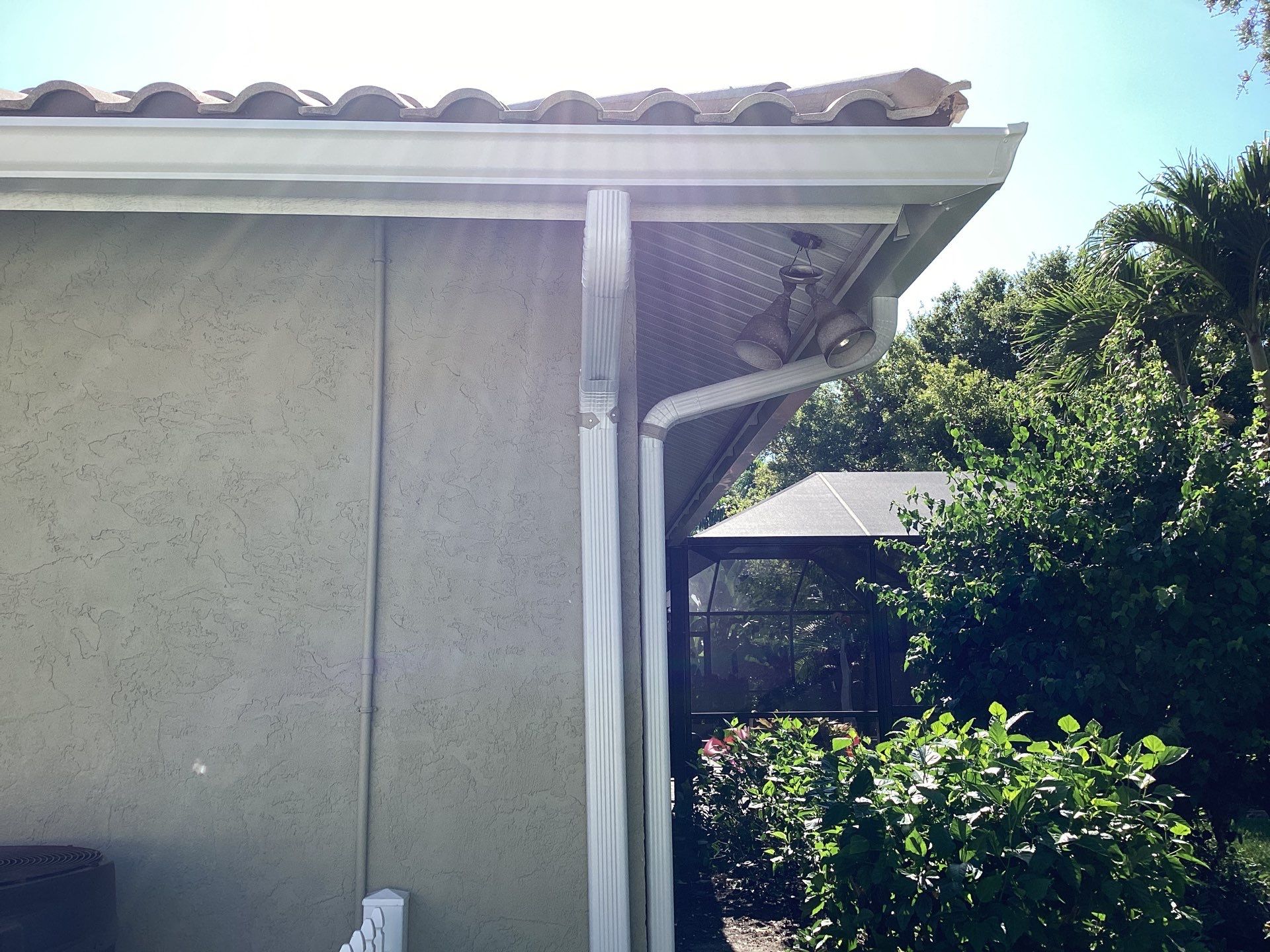 White Gutter Installation in Sarasota FL by Gutter Professors