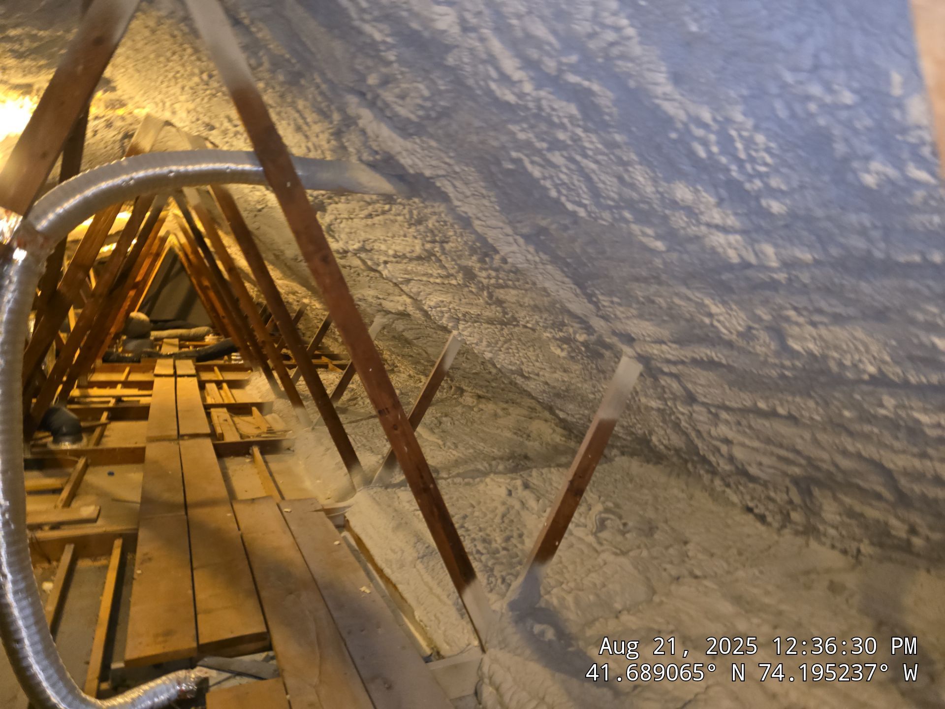 Attic Insulation using open cell spray foam by NYS Foam & Energy