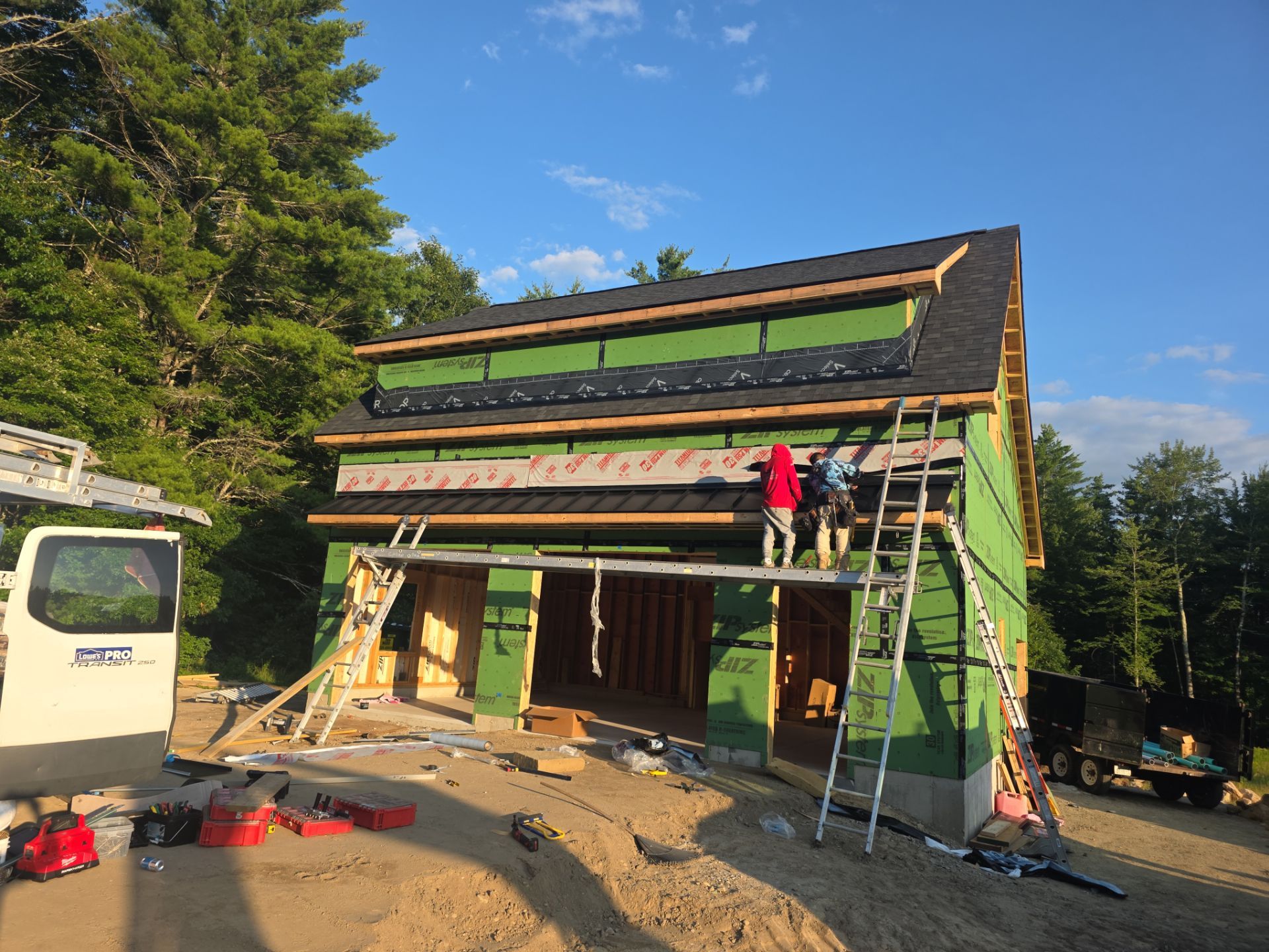 Merrimack NH ADU Roof Installation with Owens Corning Onyx Black Shingles and Standing Seam Metal Accents by Compass exteriors