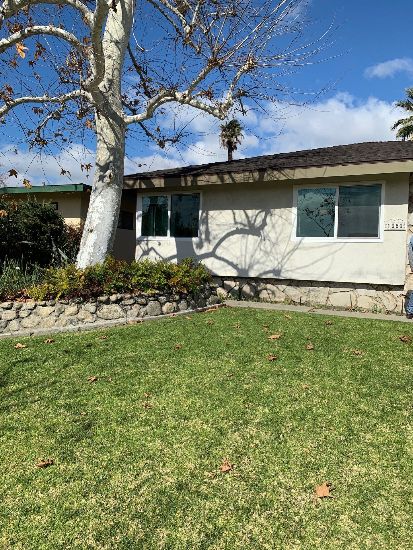 Window Installation using Black Vinyl Windows by American Window Company