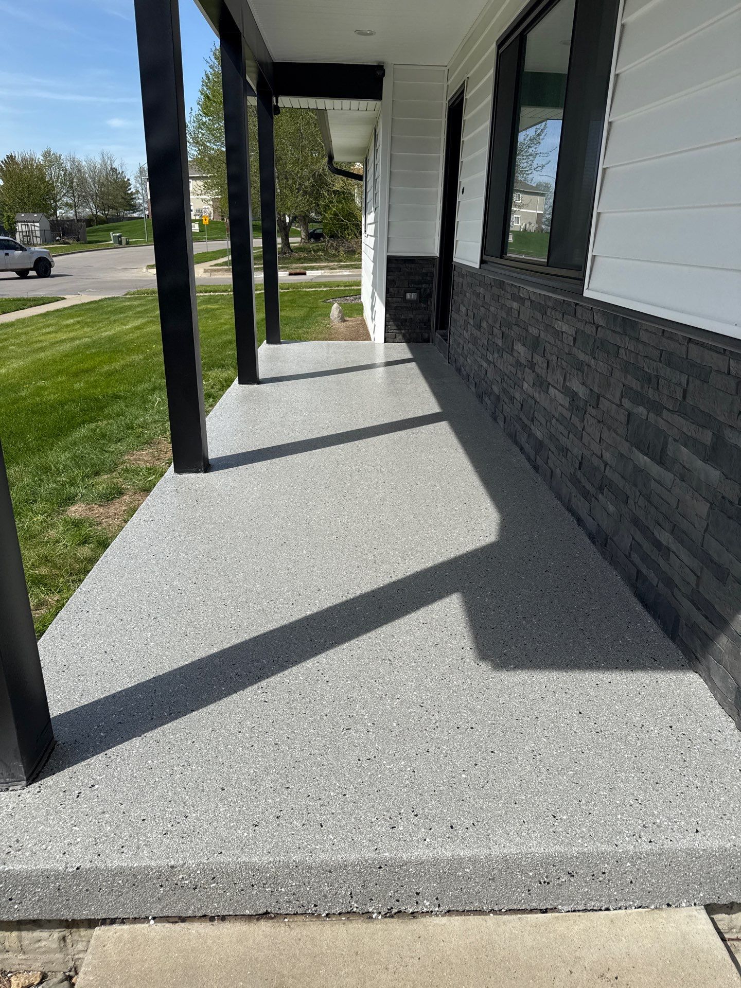 Indianola Porch Transformation by Revival Concrete Coatings