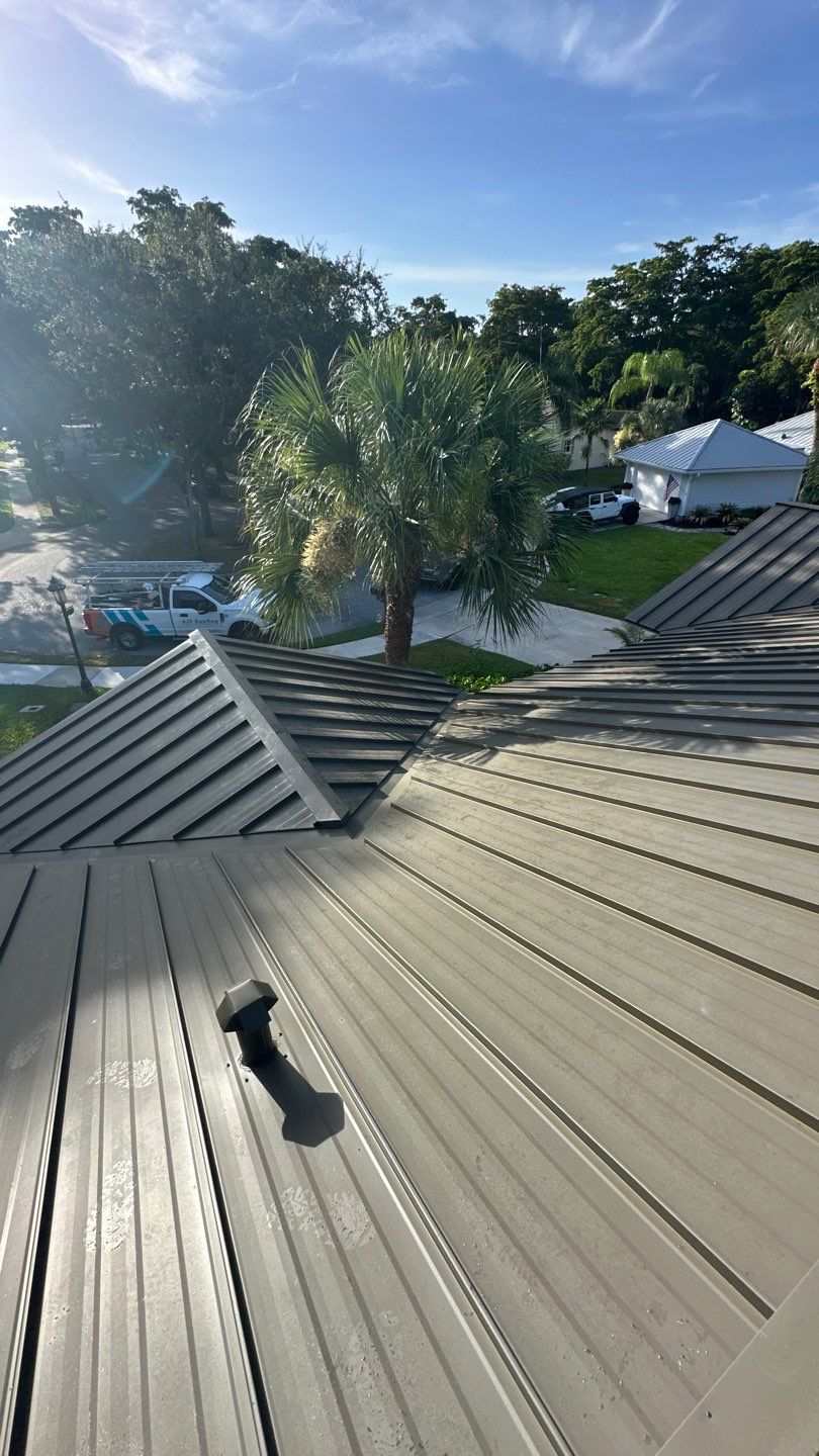 Residential Standing Seam Metal and Polyglass Flat Roof Replacement Boca Raton by AJF ROOFING INC