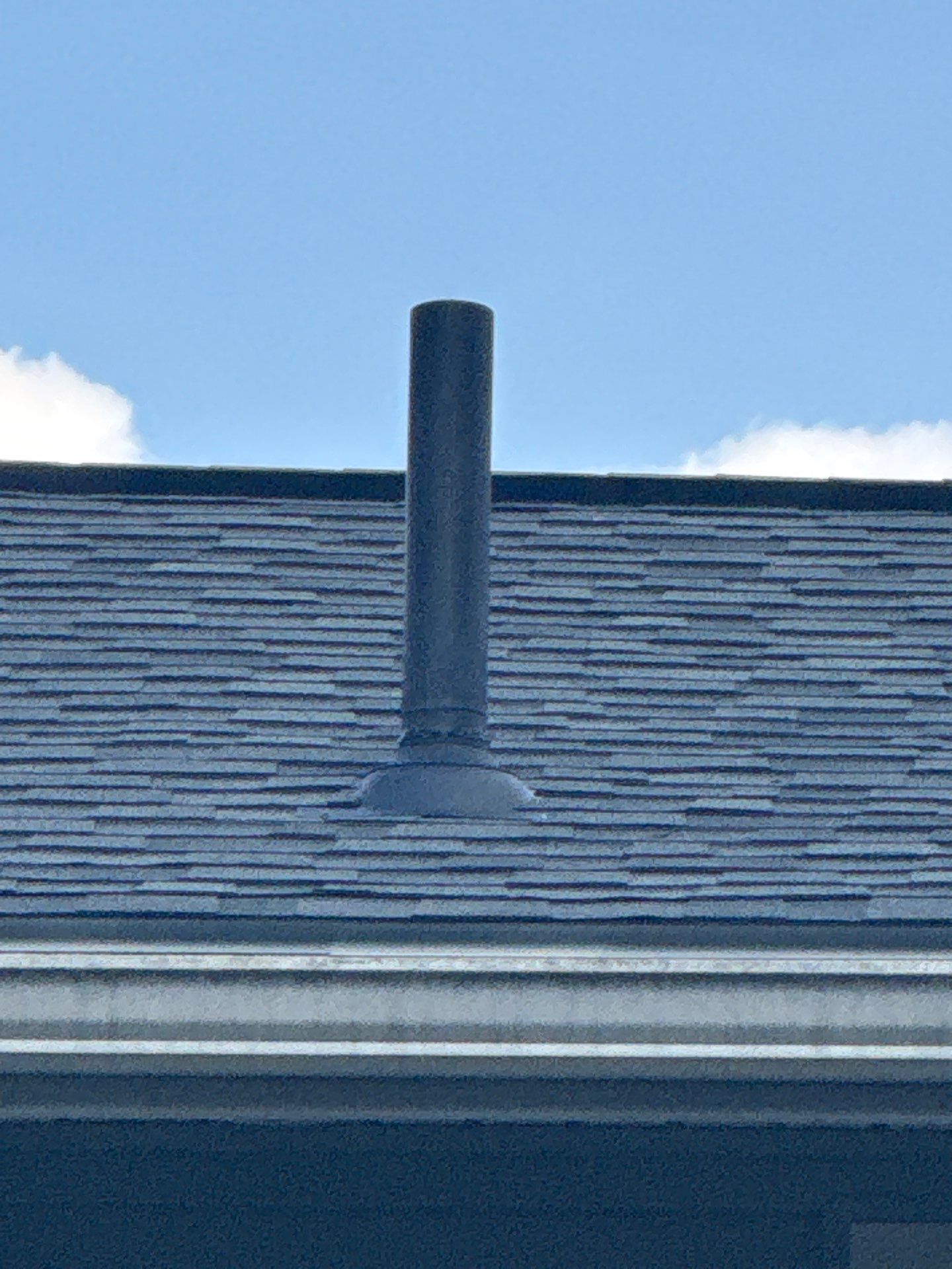 Complete Roof Replacement with Chimney Flashing, Gutter Guard System, and Vinyl Siding Repairs by Mighty Dog Roofing of Greater Middlesex County