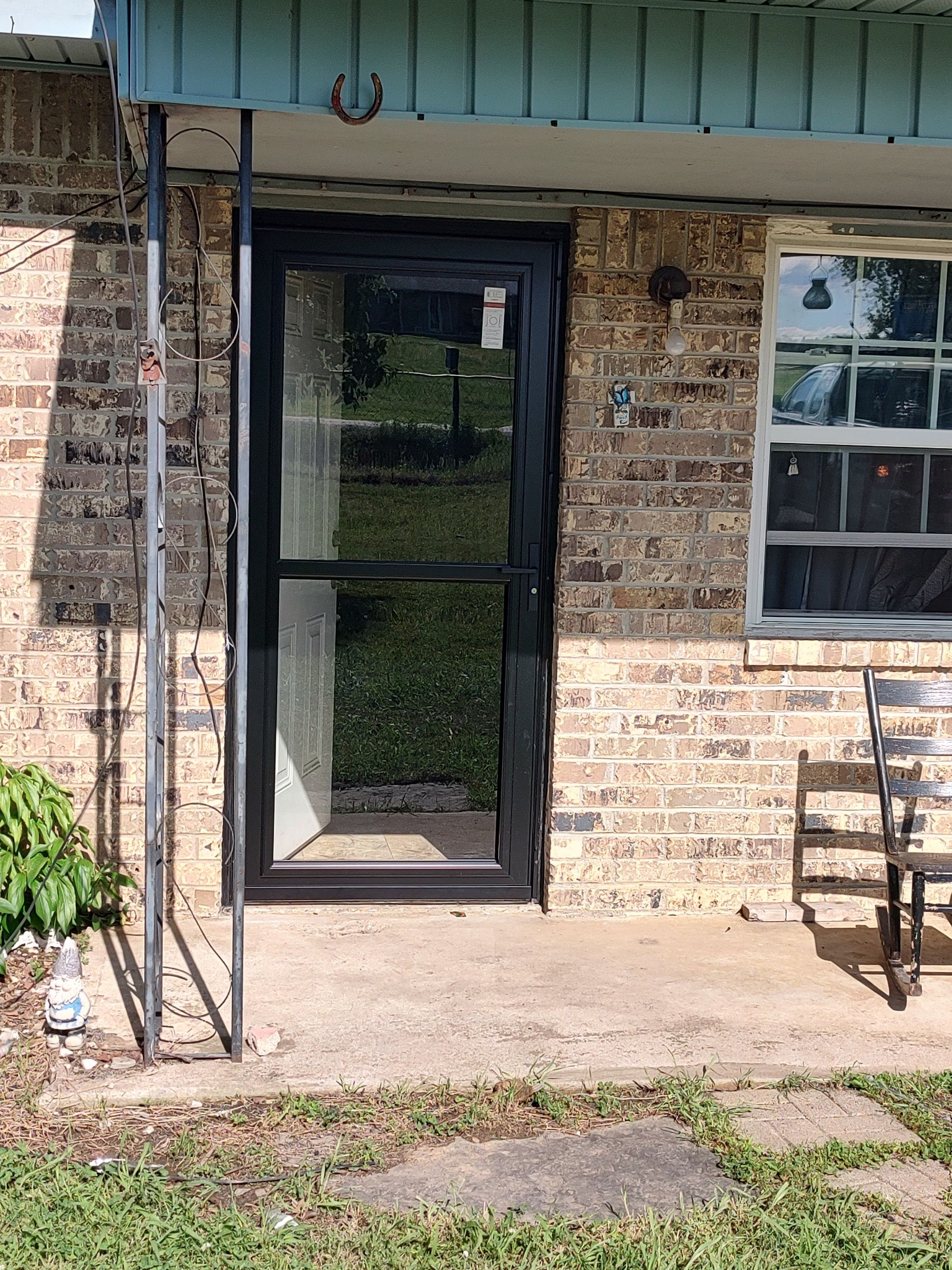 Roof replacement & Storm Door by In & Out Construction & Remodeling, LLC