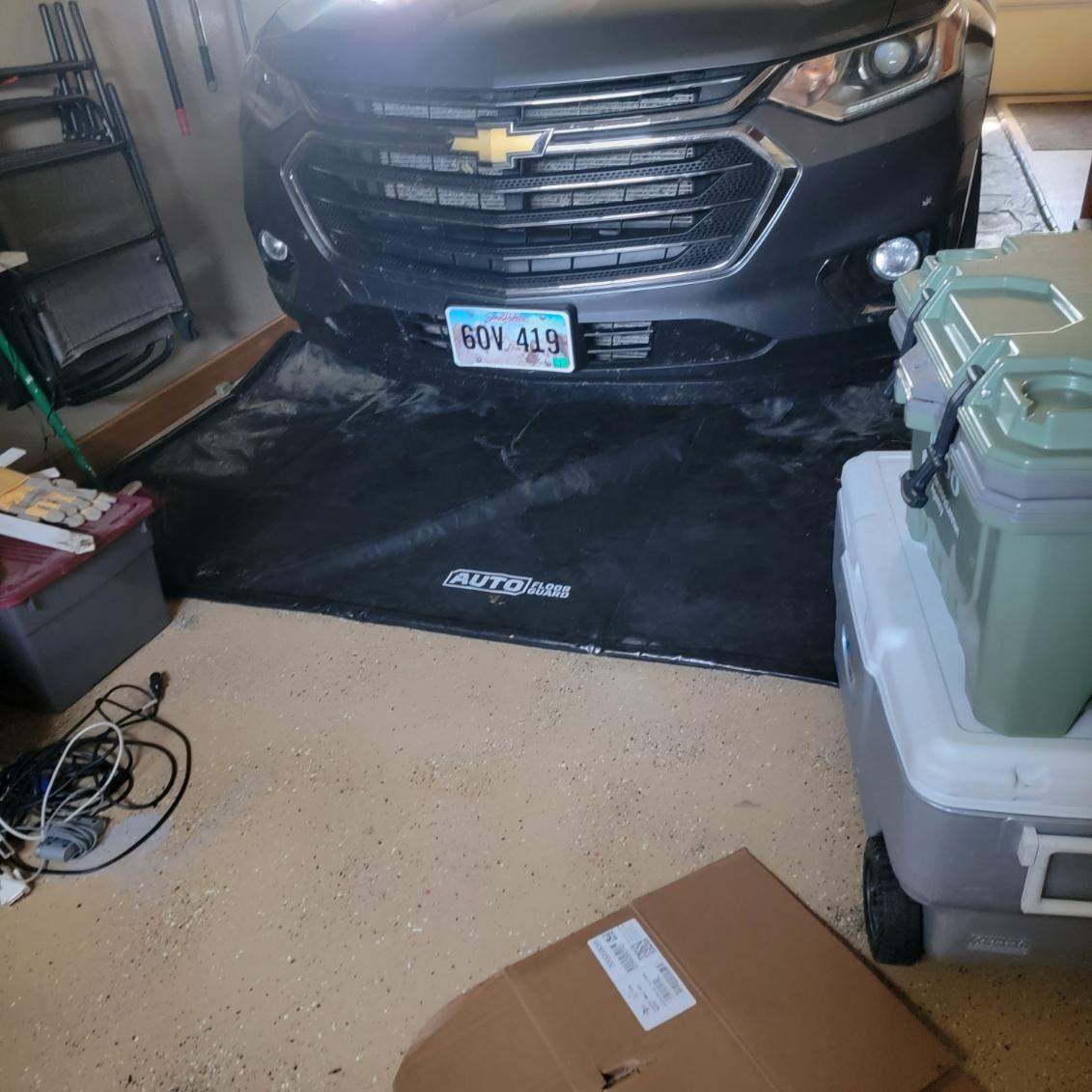 Full Garage and Basement Epoxy Floor Coating in Winner by Select Painting, Coatings & Garage Cabinets