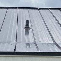 24ga 1.5" Mechanical Seam Dark Bronze by Total Roofing System The Metal Roof Experts
