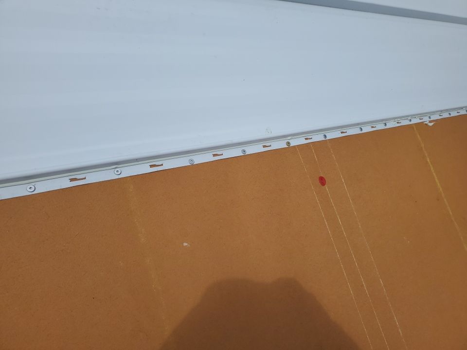 Residential Roofing Installation using 1.5" Nail Strip 24ga Solar White Kynar Coated Standing Seam Metal Panels by Morton Roofing, Inc.