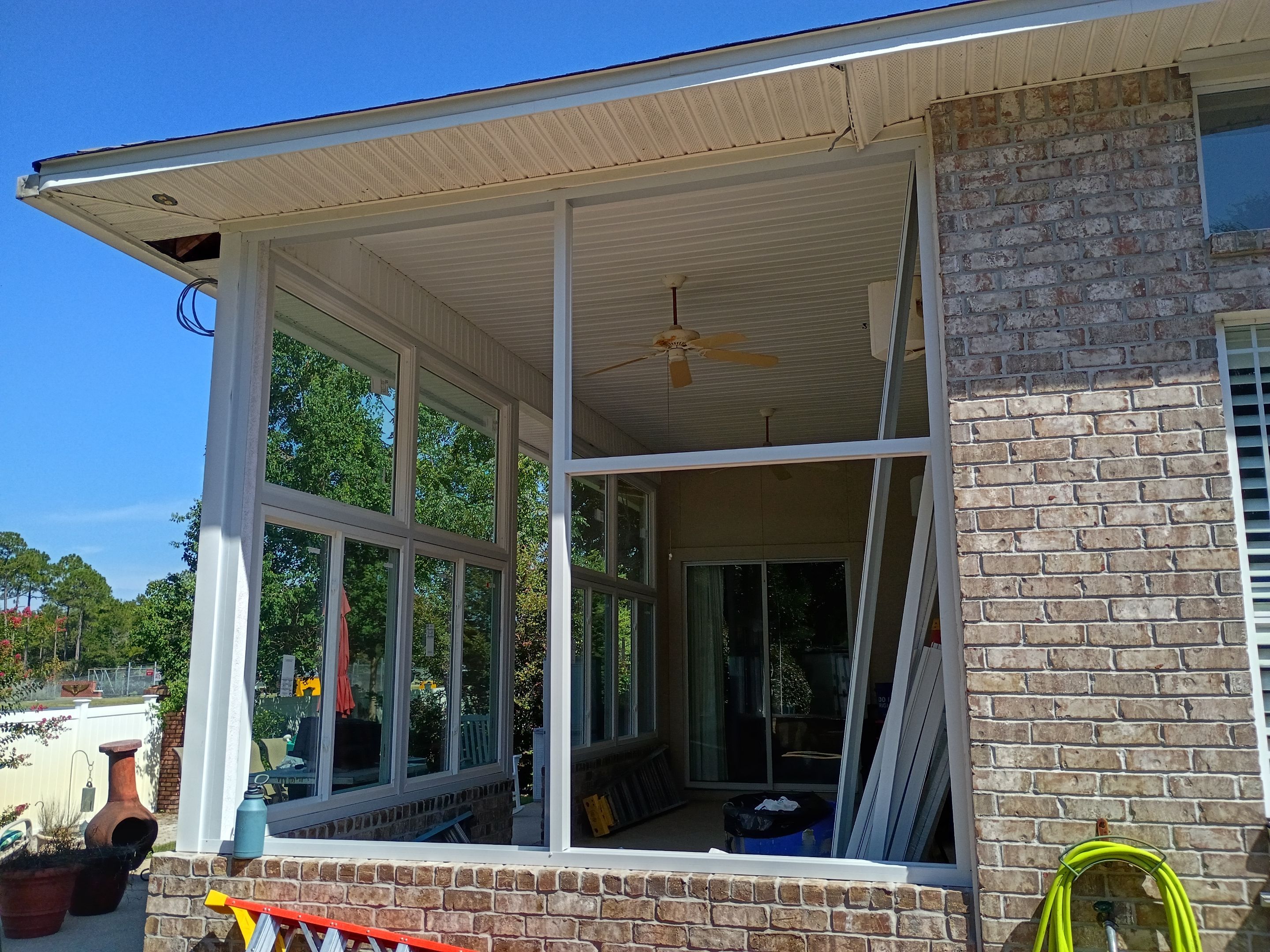 Screen Room Conversion to Glass Under  by Titan Sunrooms