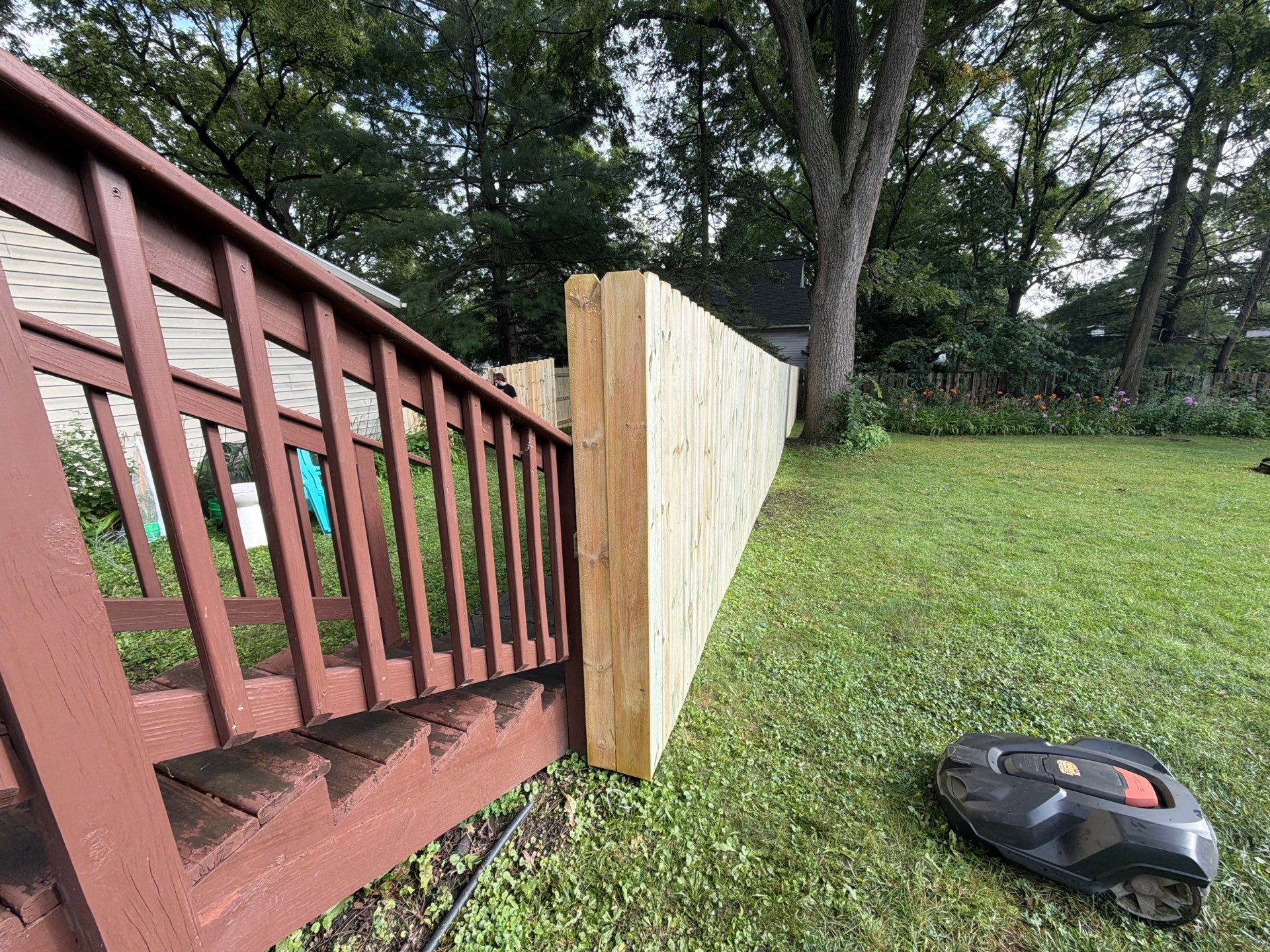 Pressure-Treated Pine Privacy Fence Installation in Cedar Falls by Perfect Picket Fence and Stain