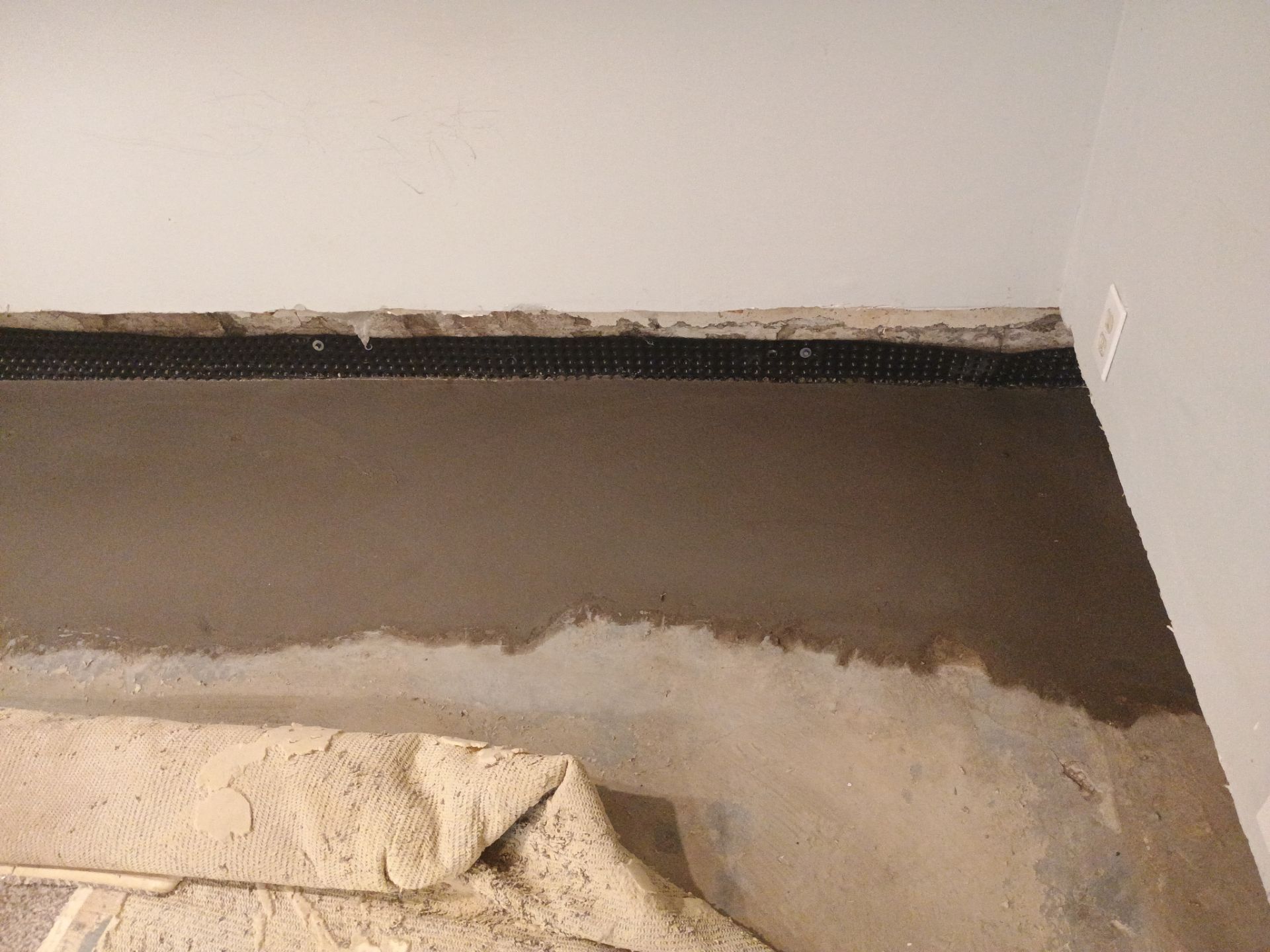 Interior Drain Tile Installation in South Minneapolis by Waterproofing Northeast