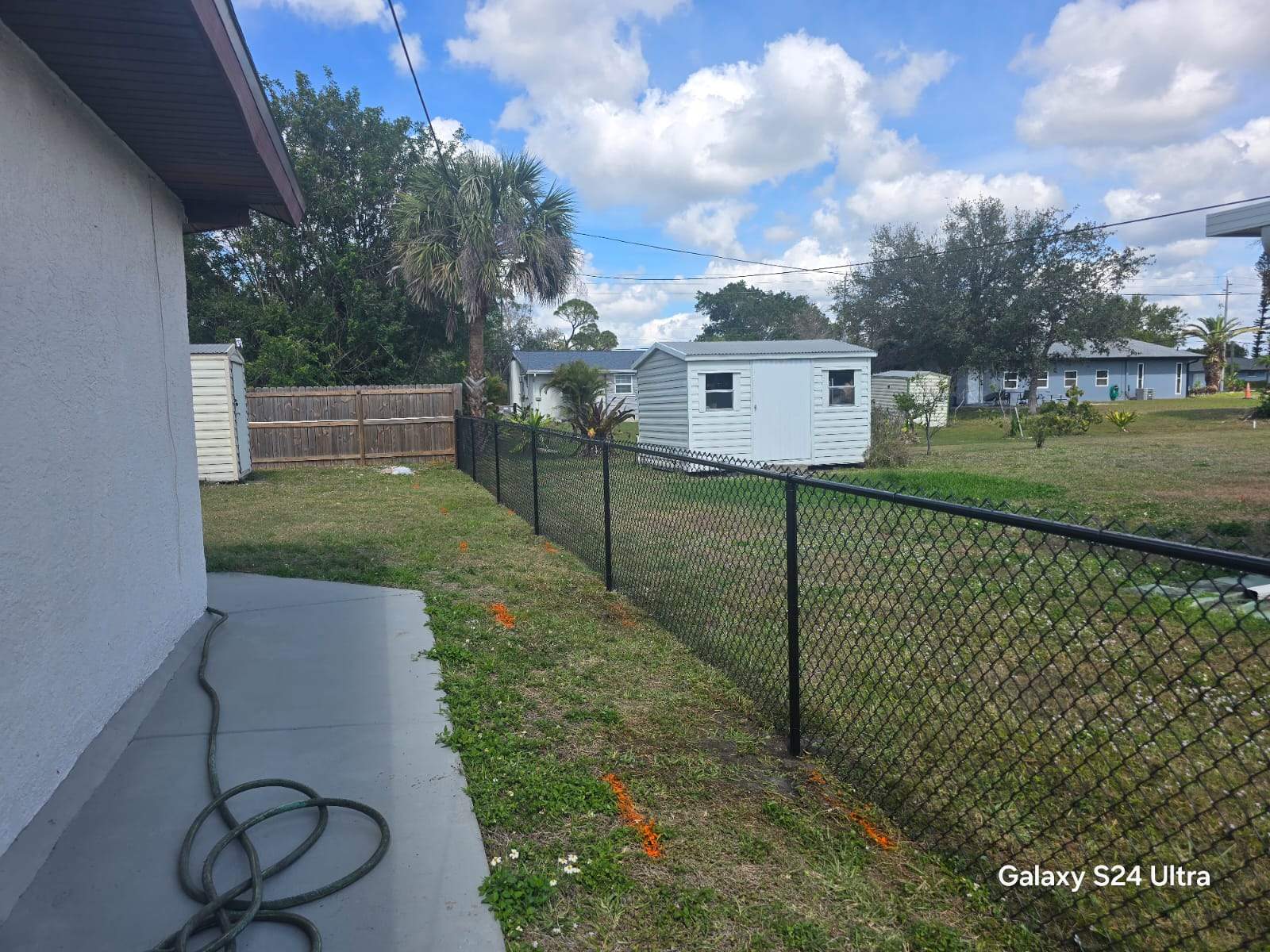 Black Chain Link Fence Installation for Port Charlotte Residence by True Fence LLC