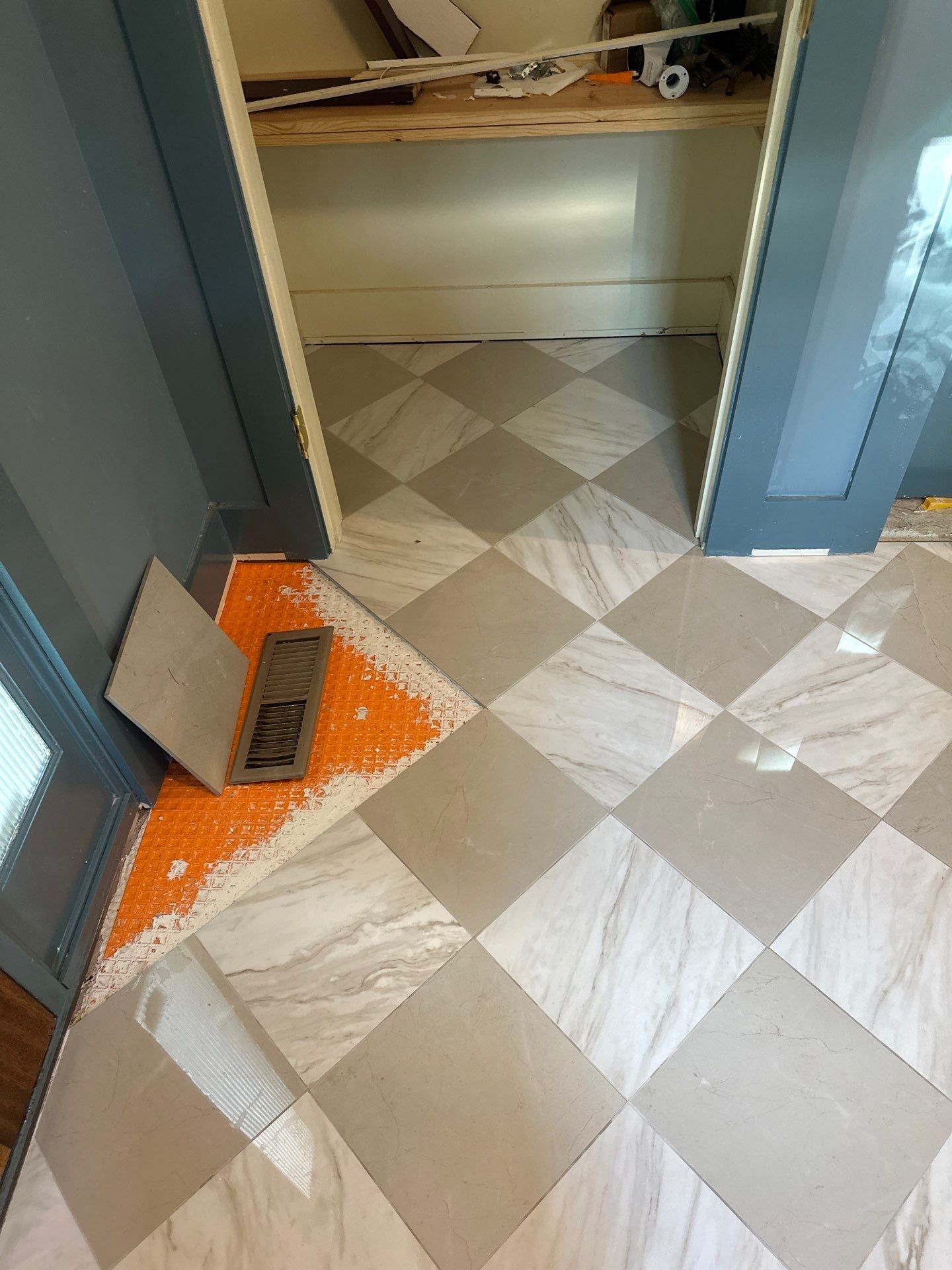 White Oak Hardwood and Checkerboard Tile Installation by Footprints Floors of Nashville
