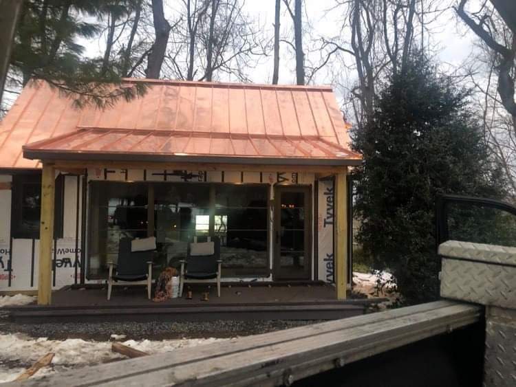 Standing Seam Metal Roof using Copper by CMNG LLC